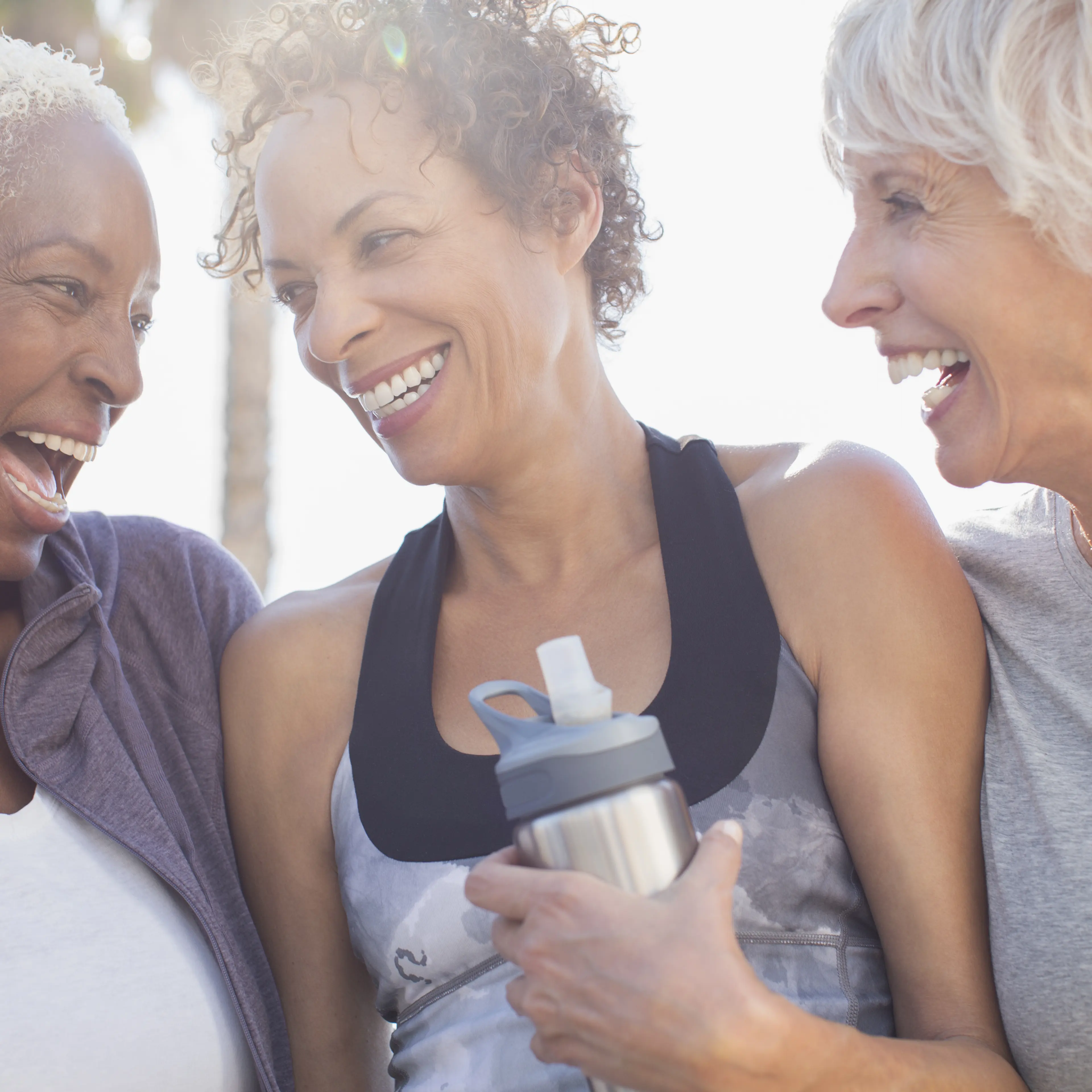 Women exercising and laughing