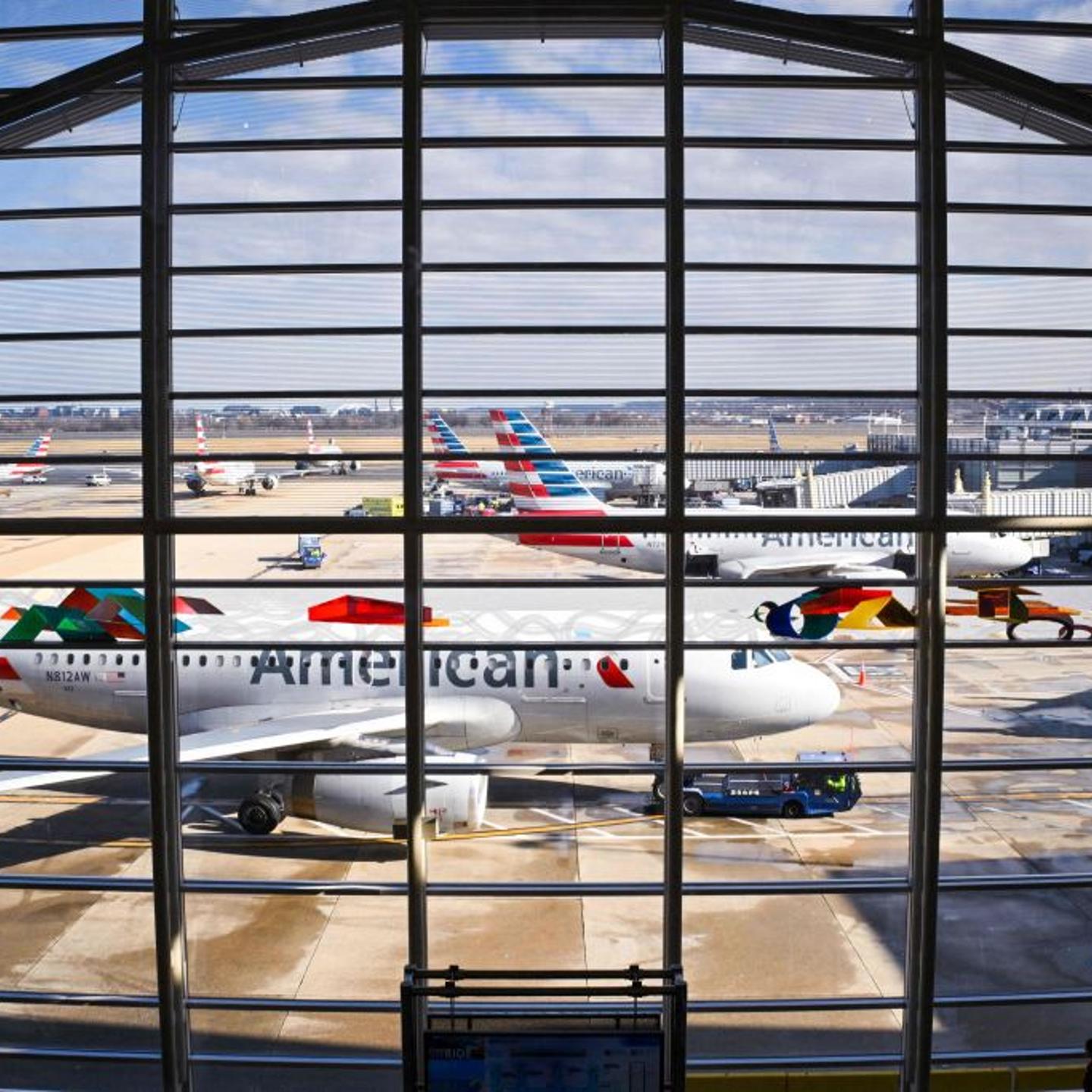 American Airlines airplanes sit on the tarmac of Reagan National airport in Arlington, Virginia, on Dec. 23, 2022.
