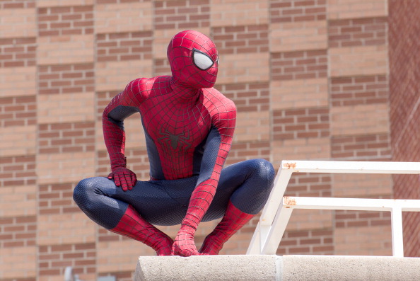 Spiderman attends "The Amazing Spider-Man 2" Be Amazing Day Volunteer Day at I.S. 145 Joseph Pulitzer on April 25, 2014 in the Queens borough of New York City.
