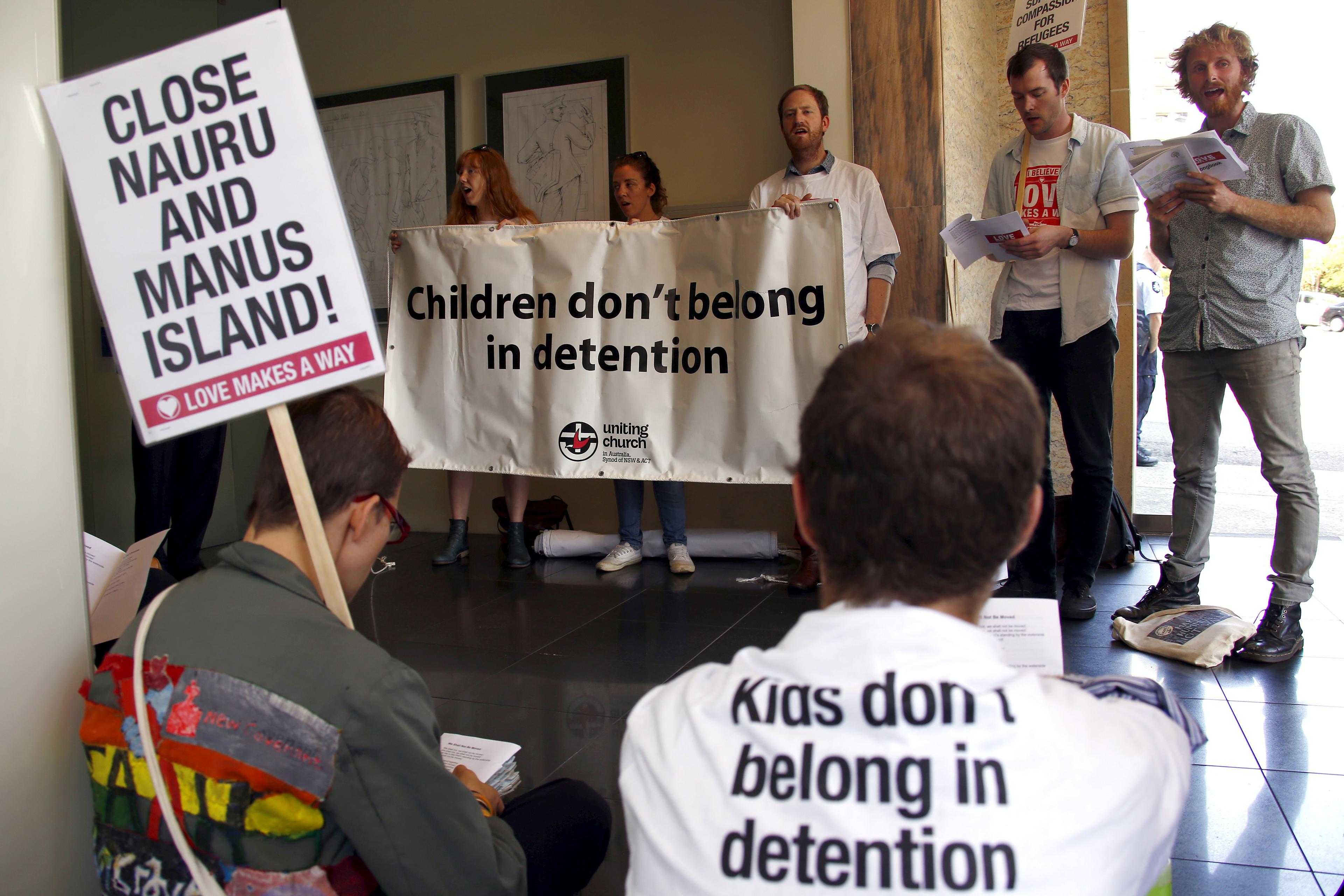 Protesters occupy Australian PM Turnbull's electoral office demanding end to policy of offshore detention in Sydney suburb of Edgecliff, Australia