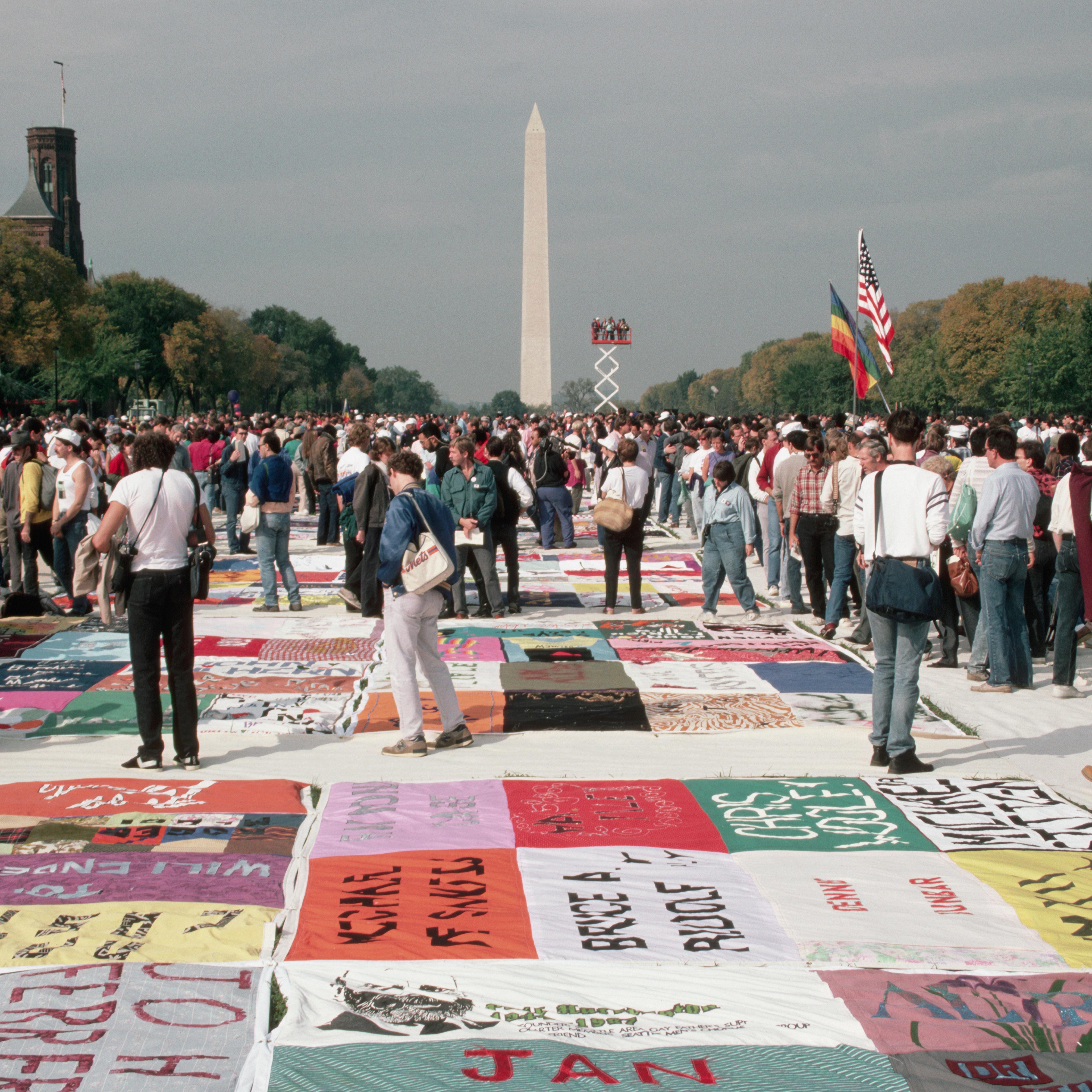 People Looking at the AIDS Quilt