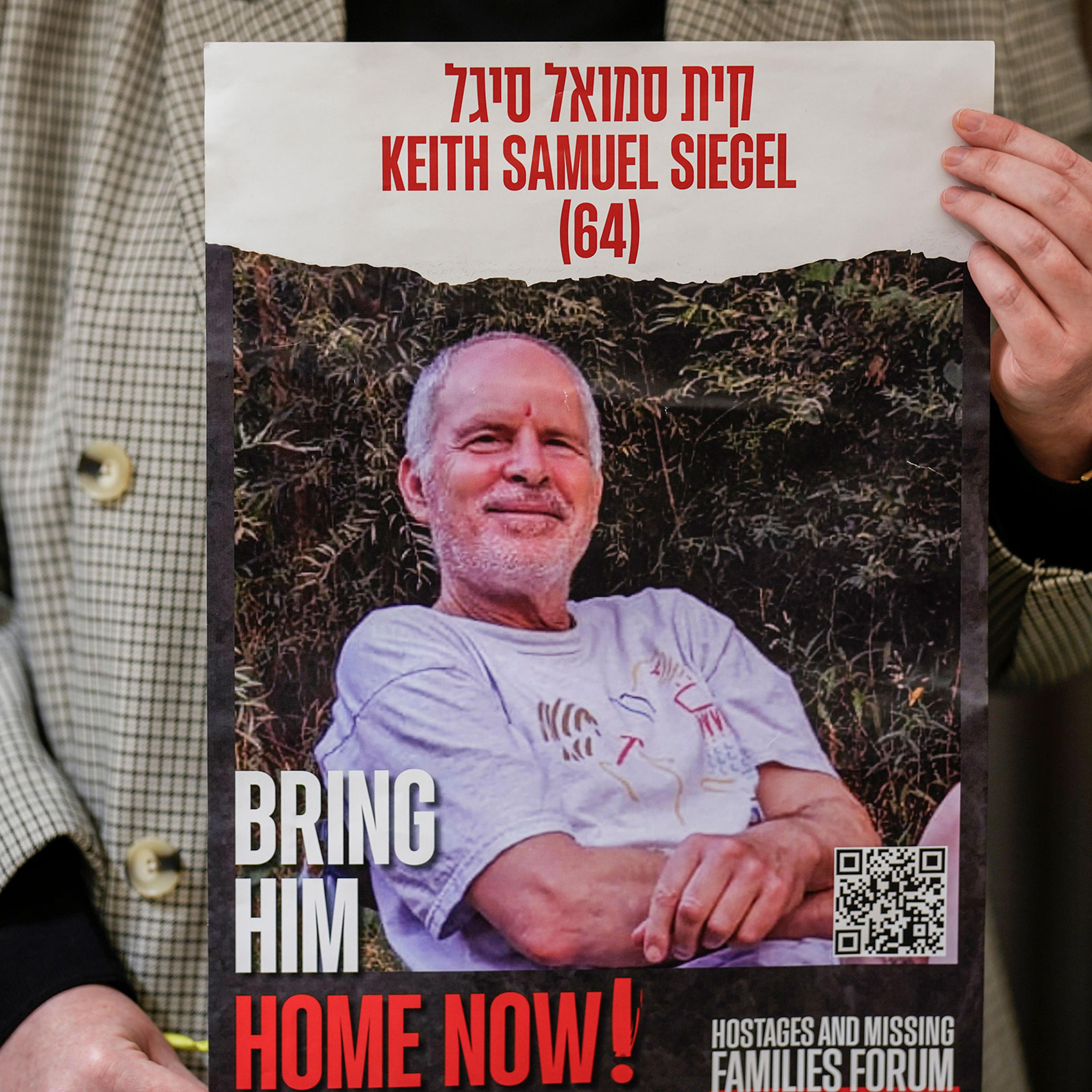 Tal Wax holds a poster with a photograph of her uncle Keith Samuel Siegel, an Israeli-American hostage held in Gaza since the Oct. 7 attacks by Hamas during a press conference in Madrid, Spain, on Jan. 25, 2024.