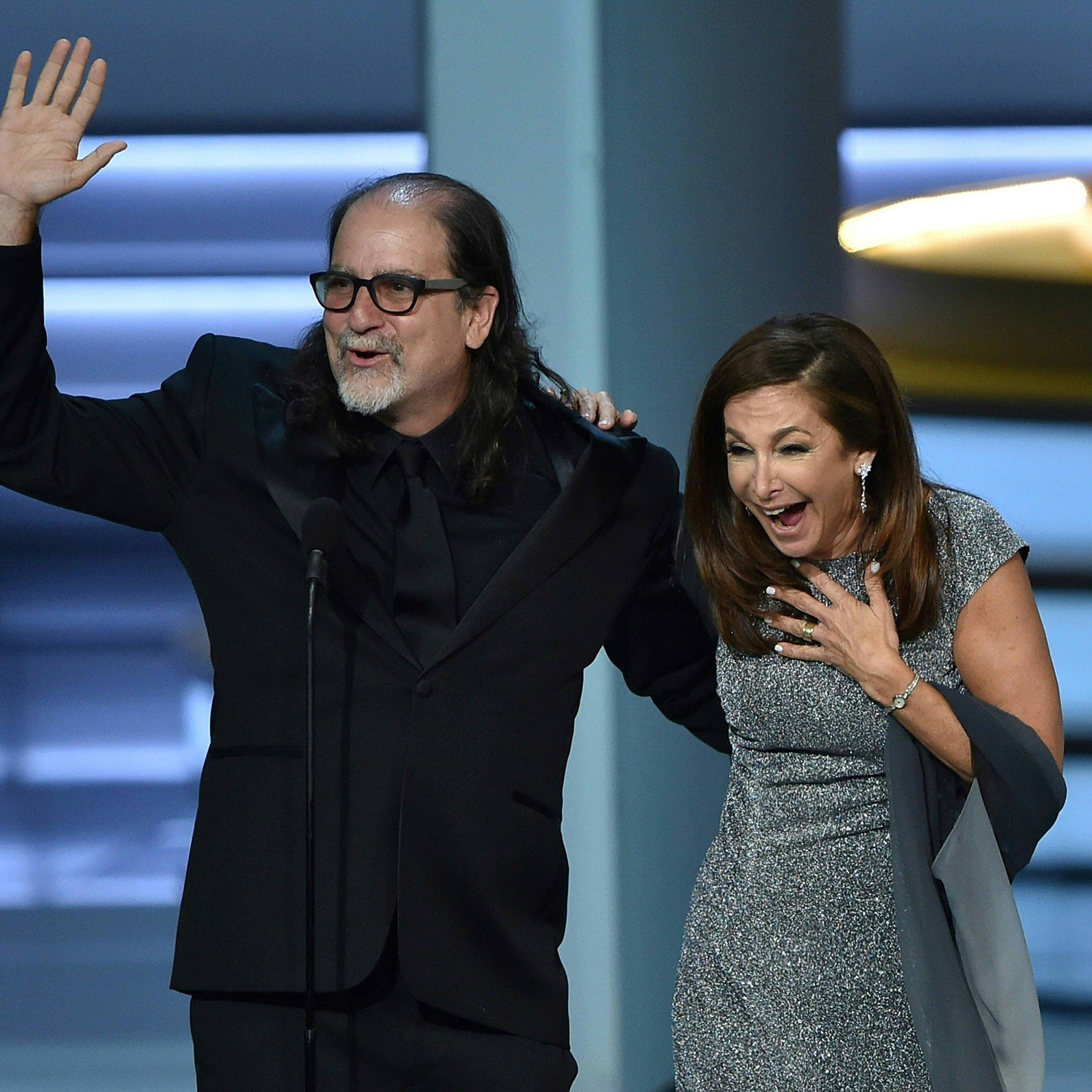 Glenn Weiss, winner of the Outstanding Directing for a Variety Special award for 'The Oscars,' waves to the audience after proposing to Jan Svendsen onstage during the 70th Emmy Awards at the Microsoft Theatre in Los Angeles on Sept. 17, 2018.