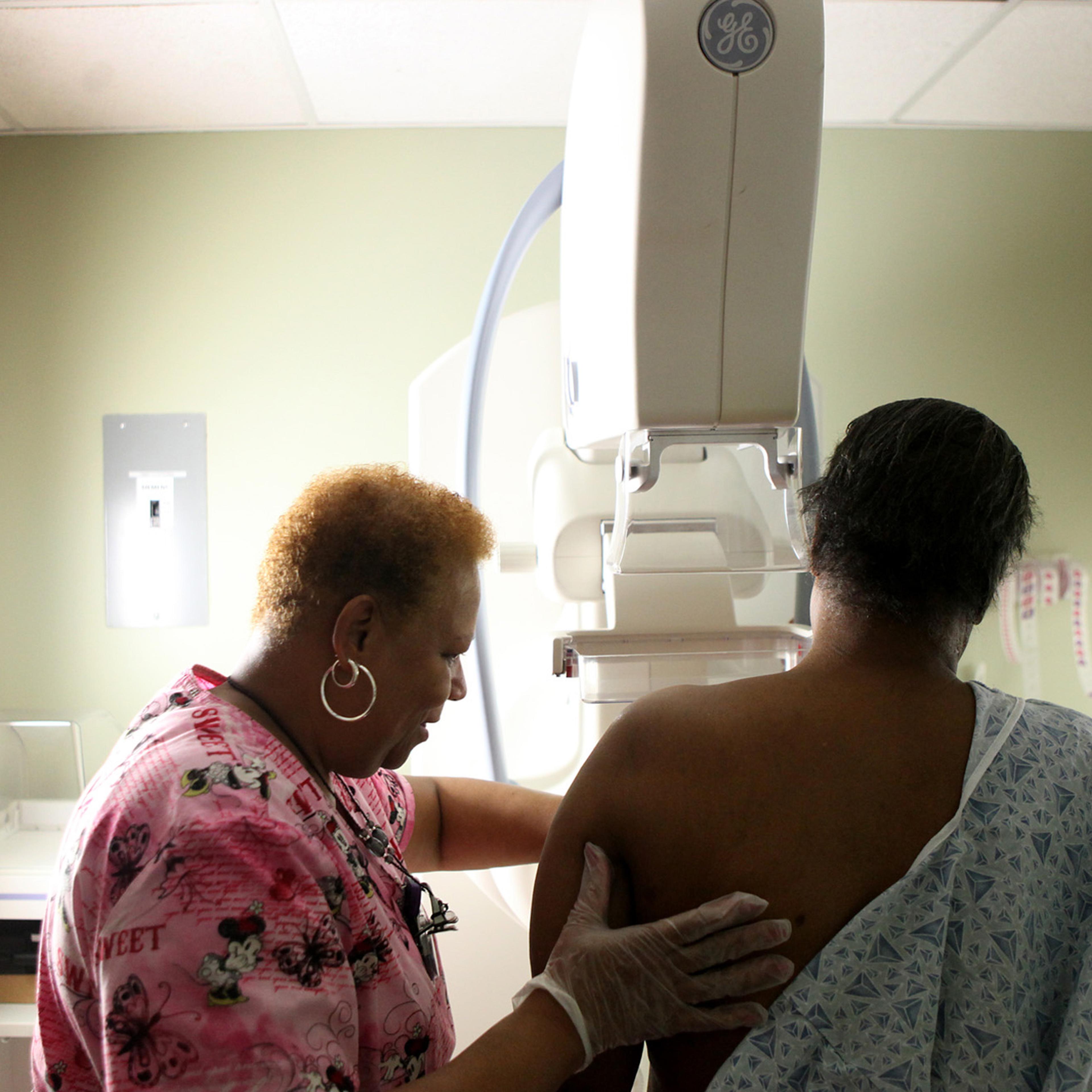 Betty Daniel, right, of Chicago, gets her routine yearly mammogram from Lead Mammography Tech Stella Palmer at Mt. Sinai Hospital in Chicago, February 15, 2012.