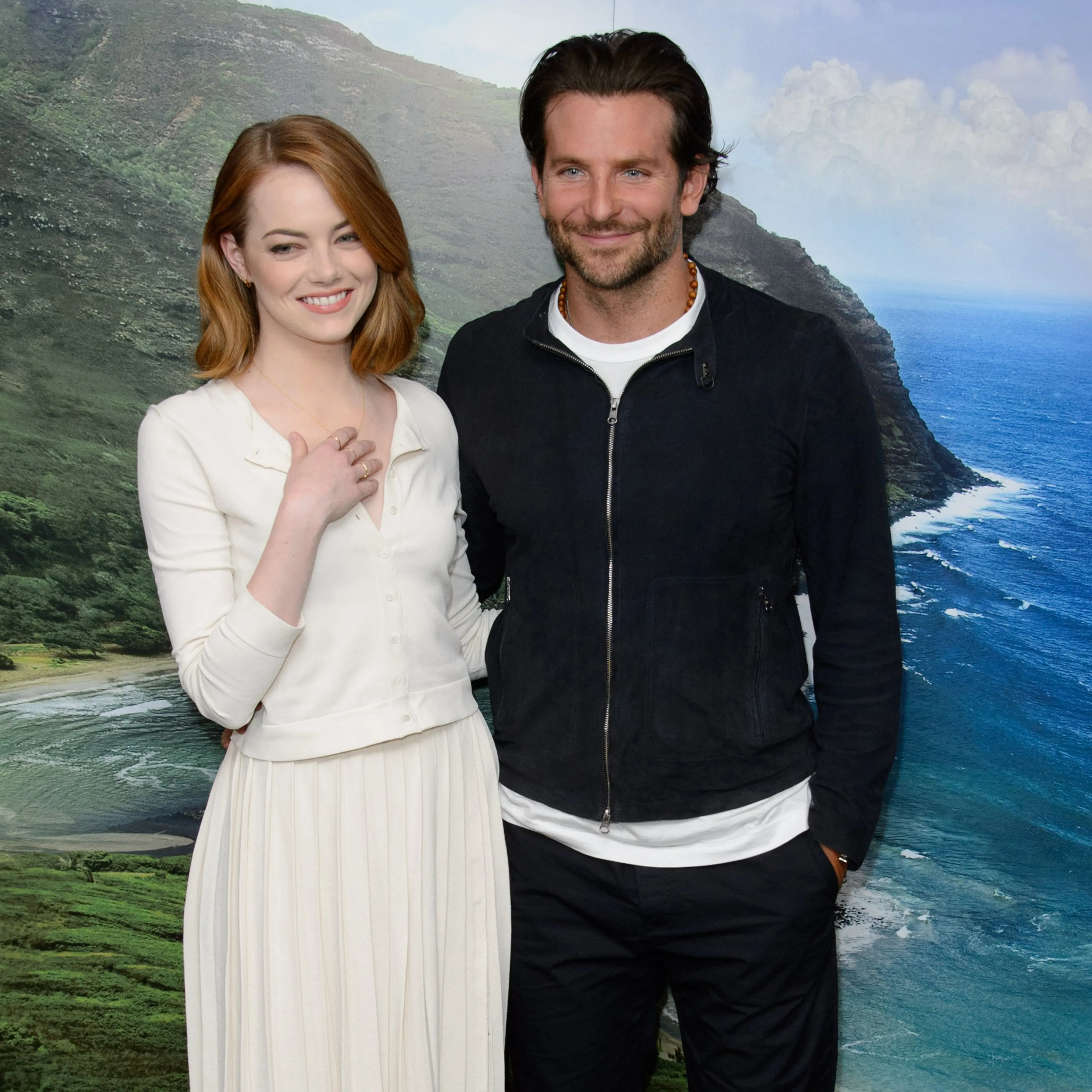 U.S actress Emma Stone and U.S actor Bradley Cooper pose for photographers at a photocall for Aloha at a central London venue