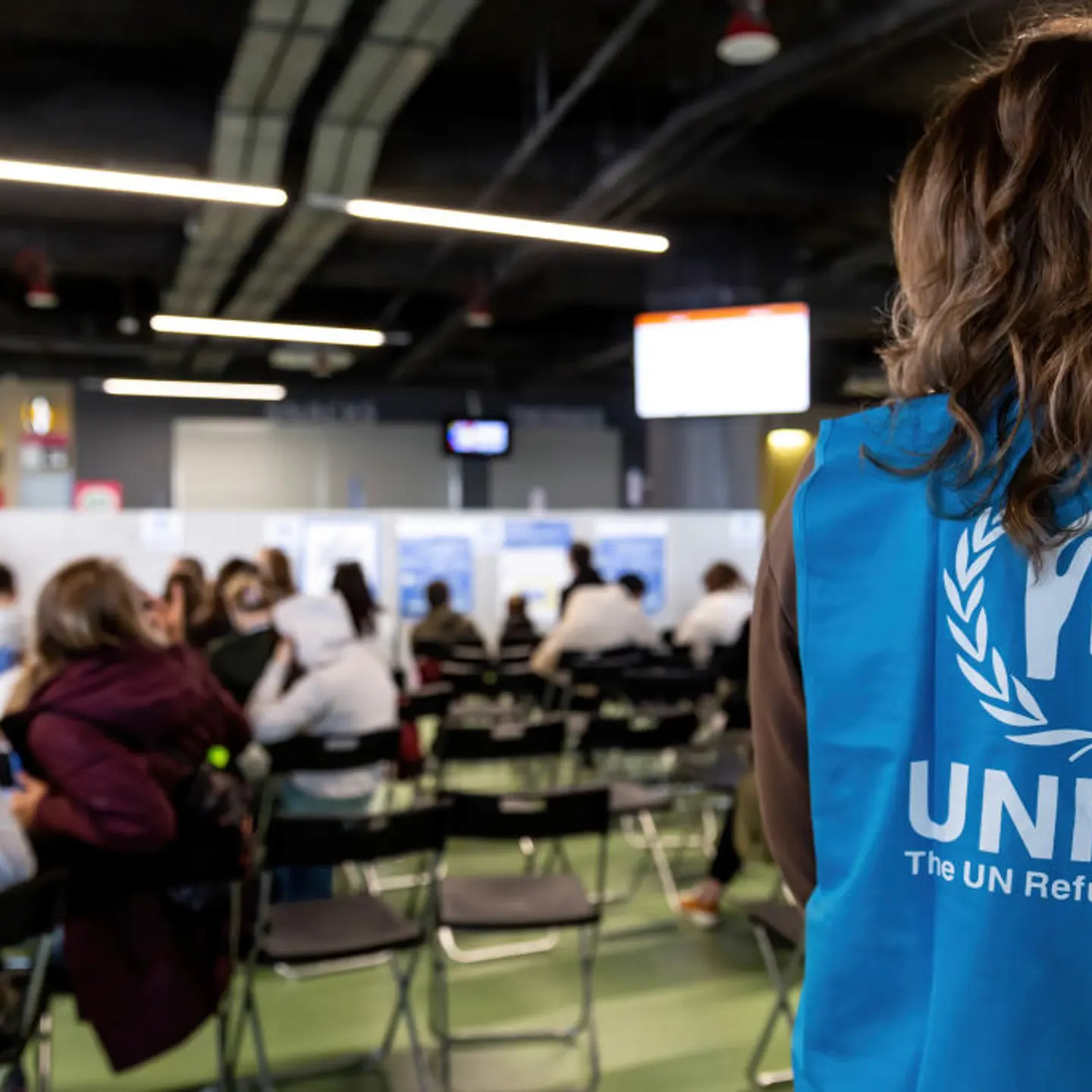 UNHCR staff supports Ukrainian refugees as they wait in