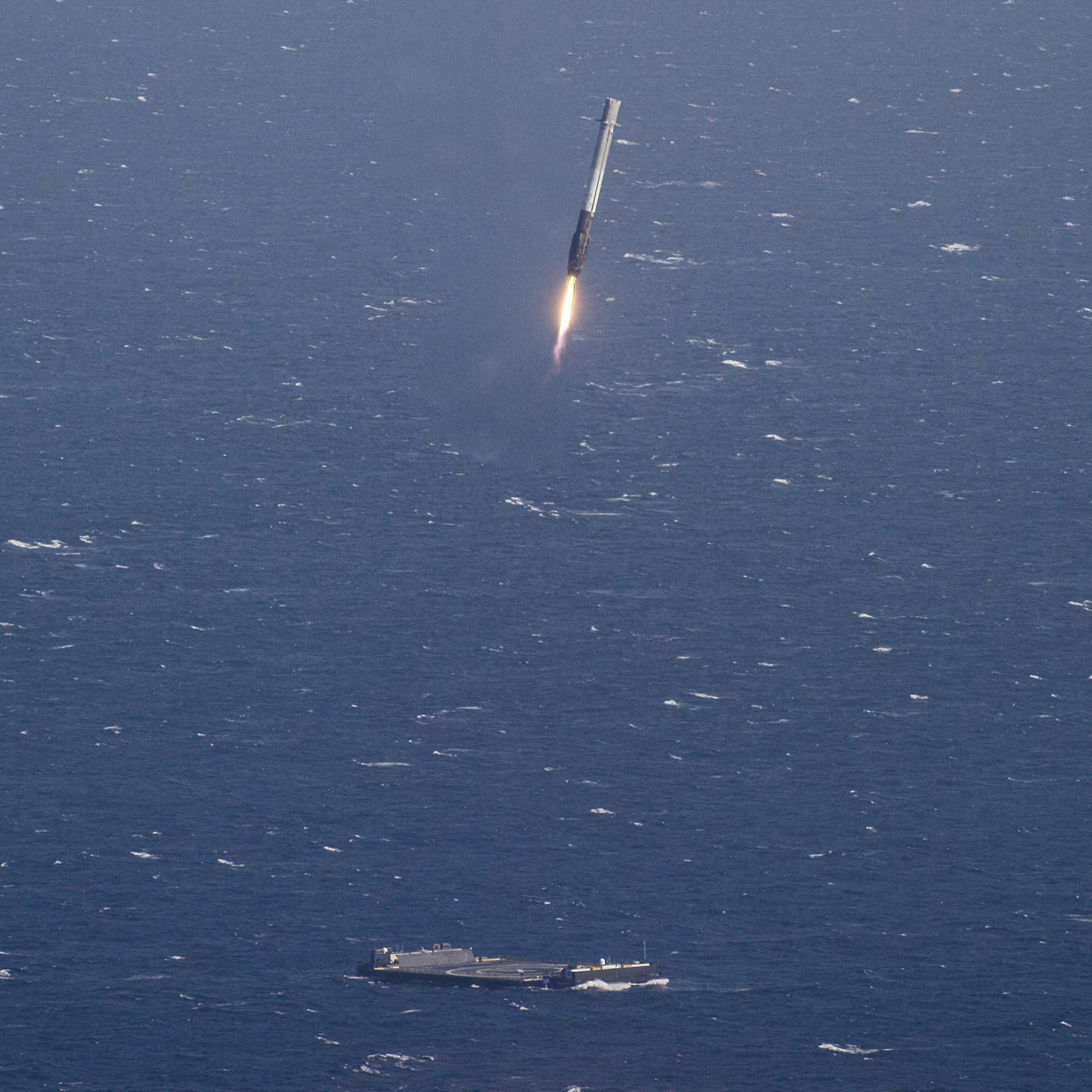 SpaceX Falcon 9 rocket successful landing on a floating platform in the Atlantic Ocean