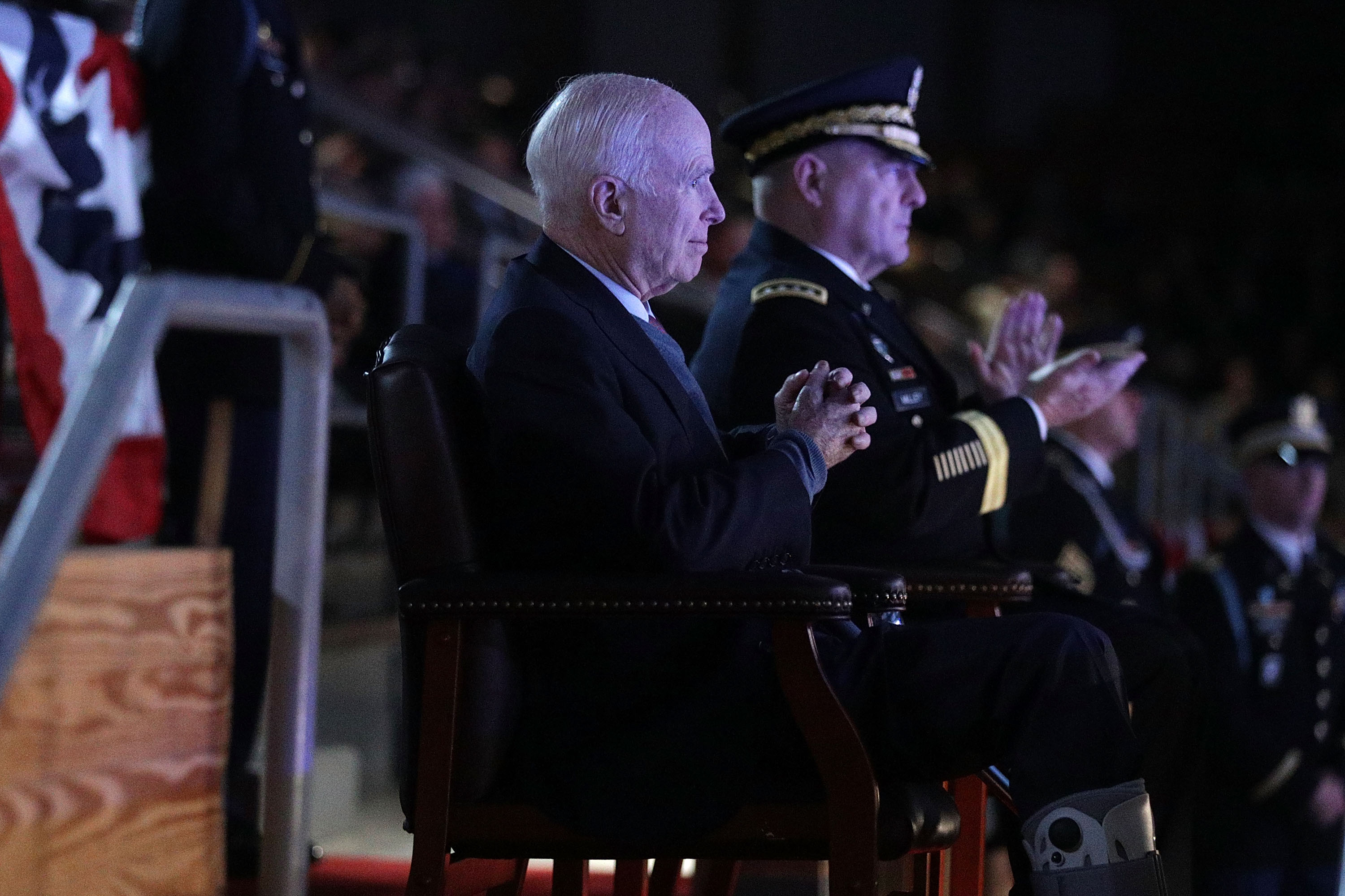 John McCain views an army performance
