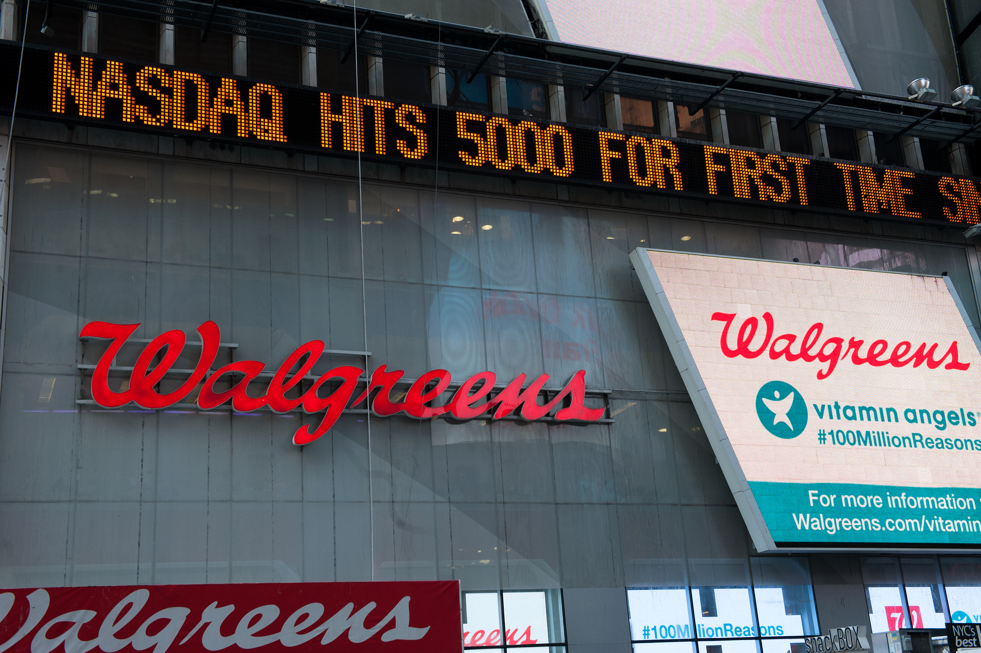 The Times Square news-ticker announces the NASDAQ composite index topping 5,000 points on March 2, 2015 in New York City.