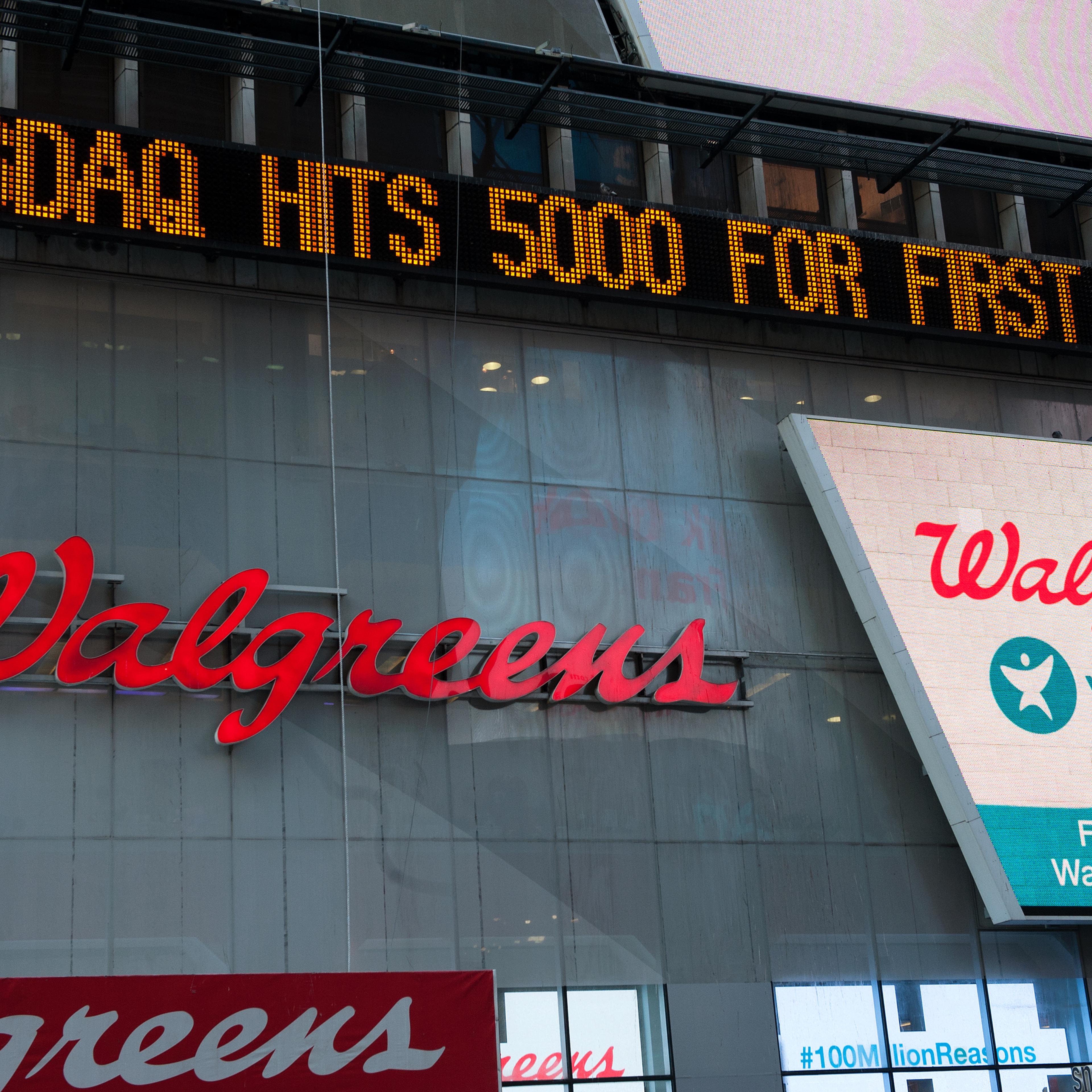 The Times Square news-ticker announces the NASDAQ composite index topping 5,000 points on March 2, 2015 in New York City.