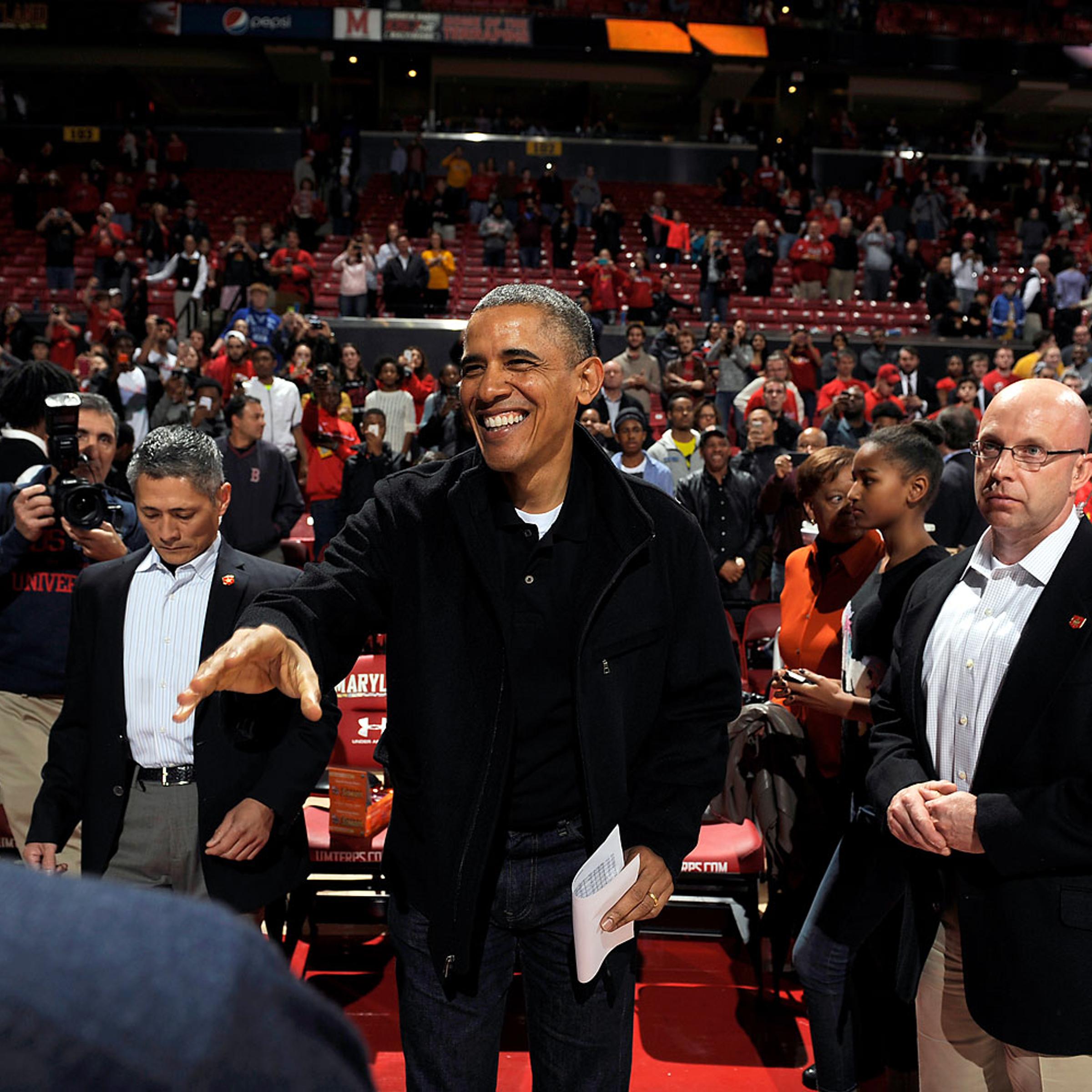 President Obama at a college basketball game between the Oregon State Beavers and the Maryland Terrapins at the Comcast Center on Nov. 17, 2013 in College Park, Maryland.