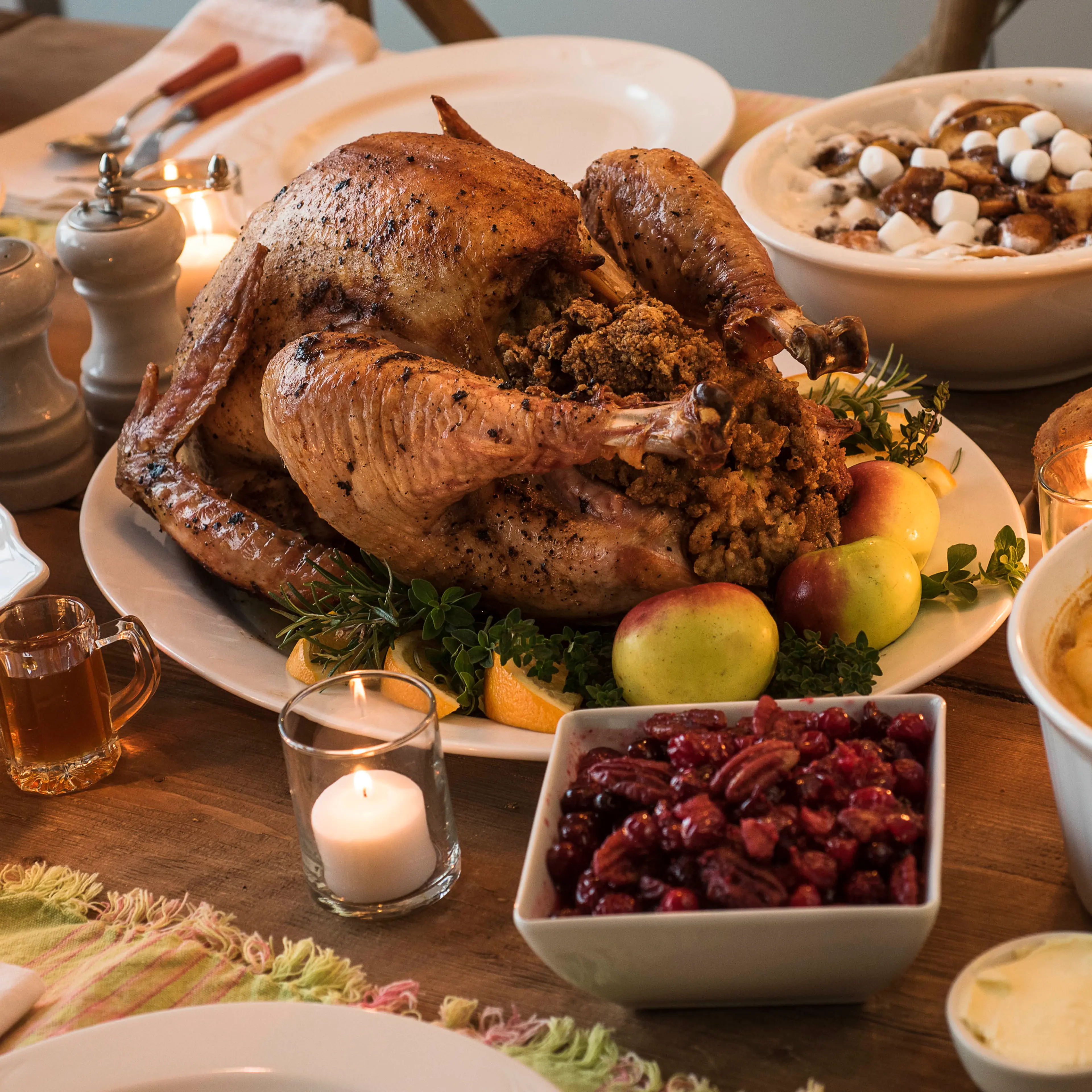 Dining table filled with thanksgiving food