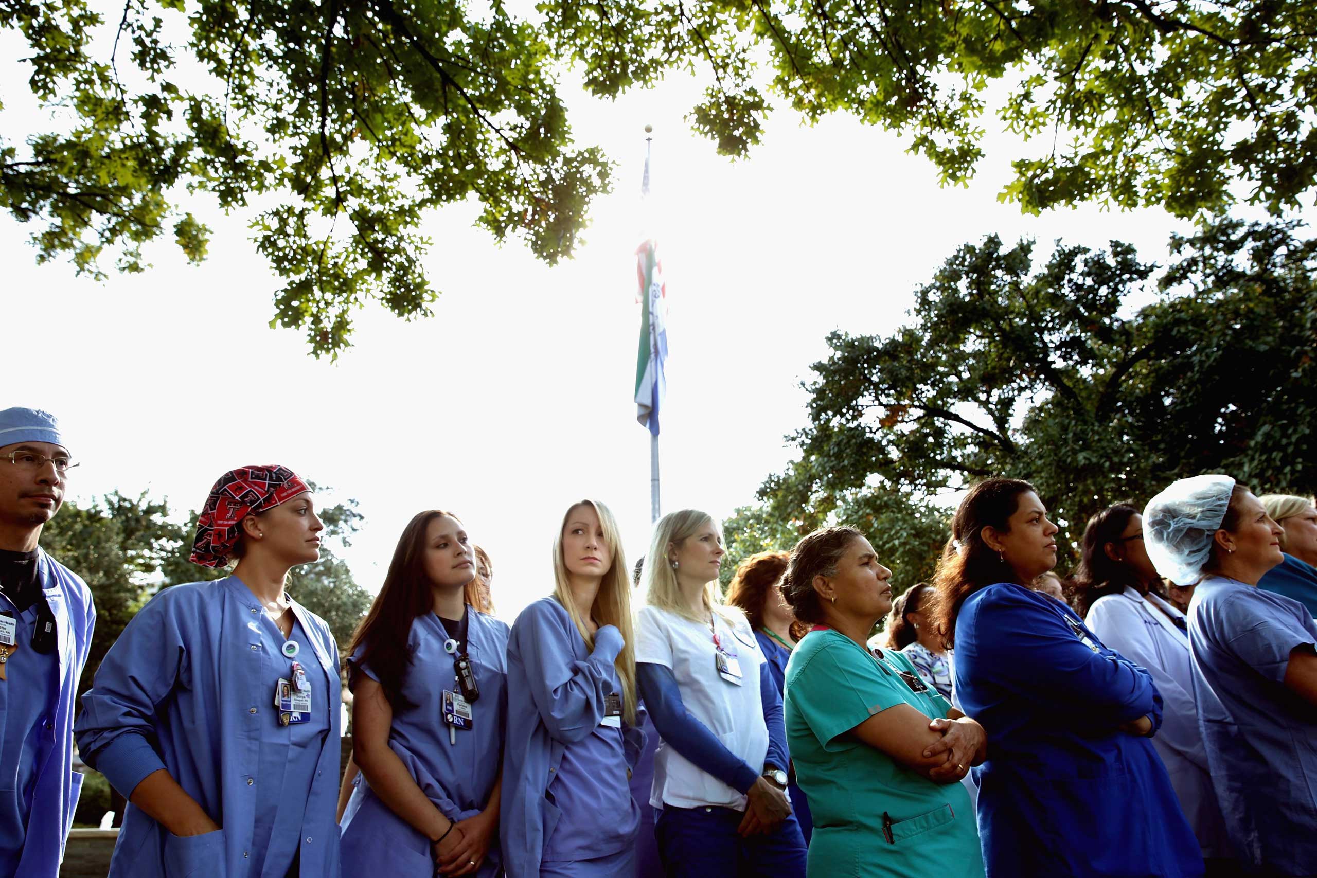 Several dozen nurses from Texas Health Presbyterian Hospital gathered in front of the hospital to show support for their employer Oct. 20, 2014 in Dallas.