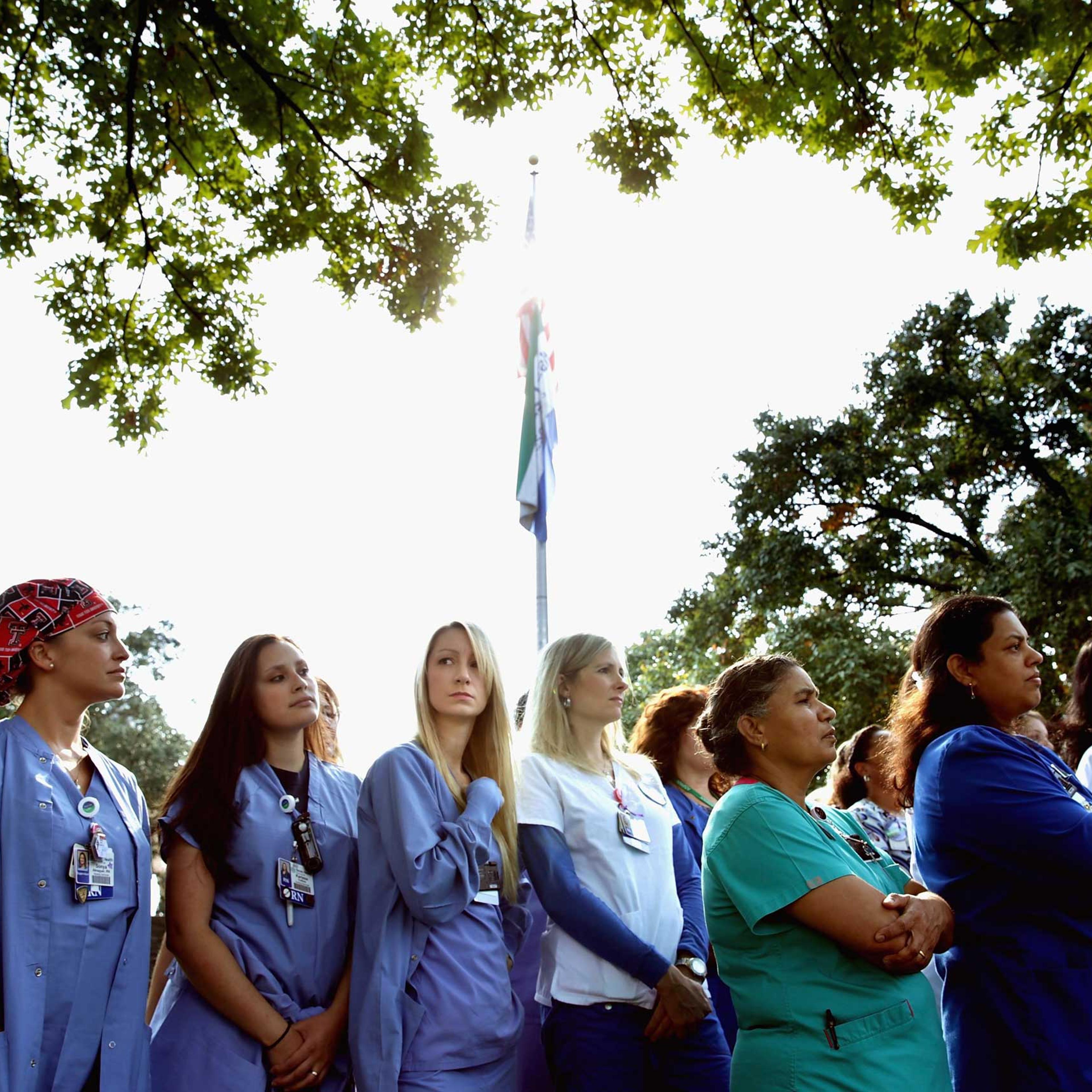 Several dozen nurses from Texas Health Presbyterian Hospital gathered in front of the hospital to show support for their employer Oct. 20, 2014 in Dallas.