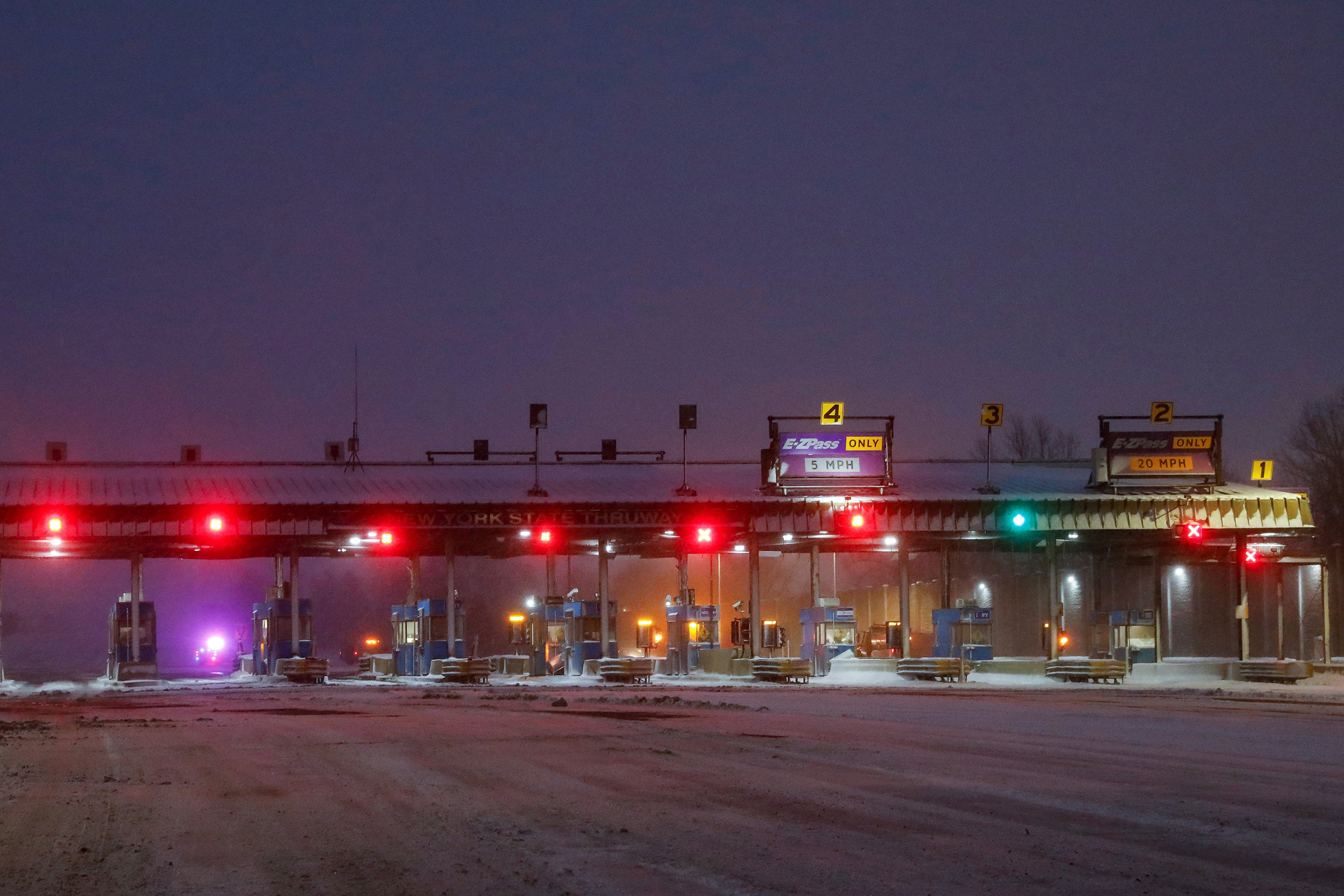 The entrance to the New York State Thruway is closed, following a major traffic incident due to blizzard-like conditions, near Buffalo, New York