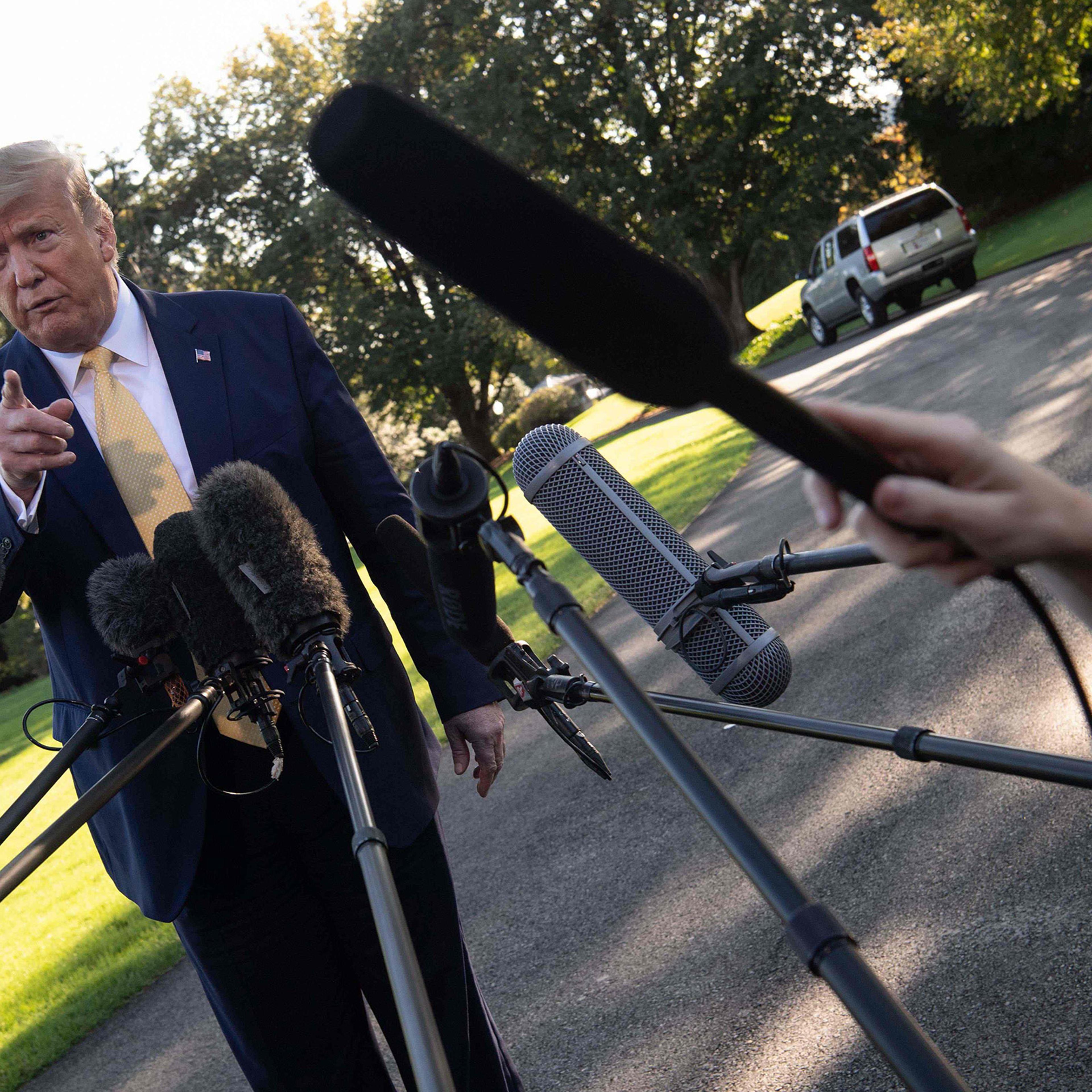 President Donald Trump speaks to the press from the South Lawn of the White House