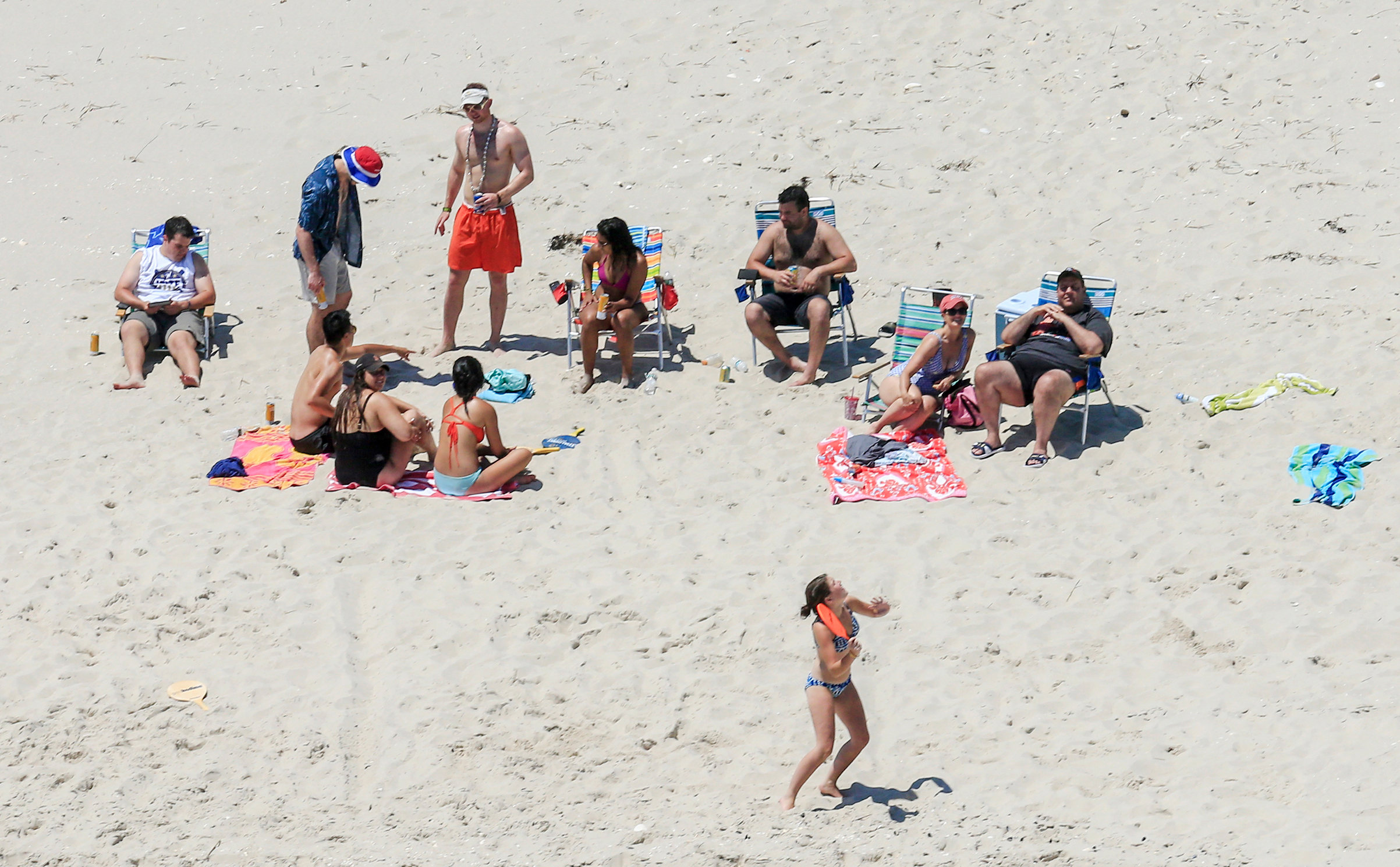 New Jersey Gov. Chris Christie, right, uses the beach with his family and friends at the governor's summer house at Island Beach State Park in New Jersey on July 2, 2017.