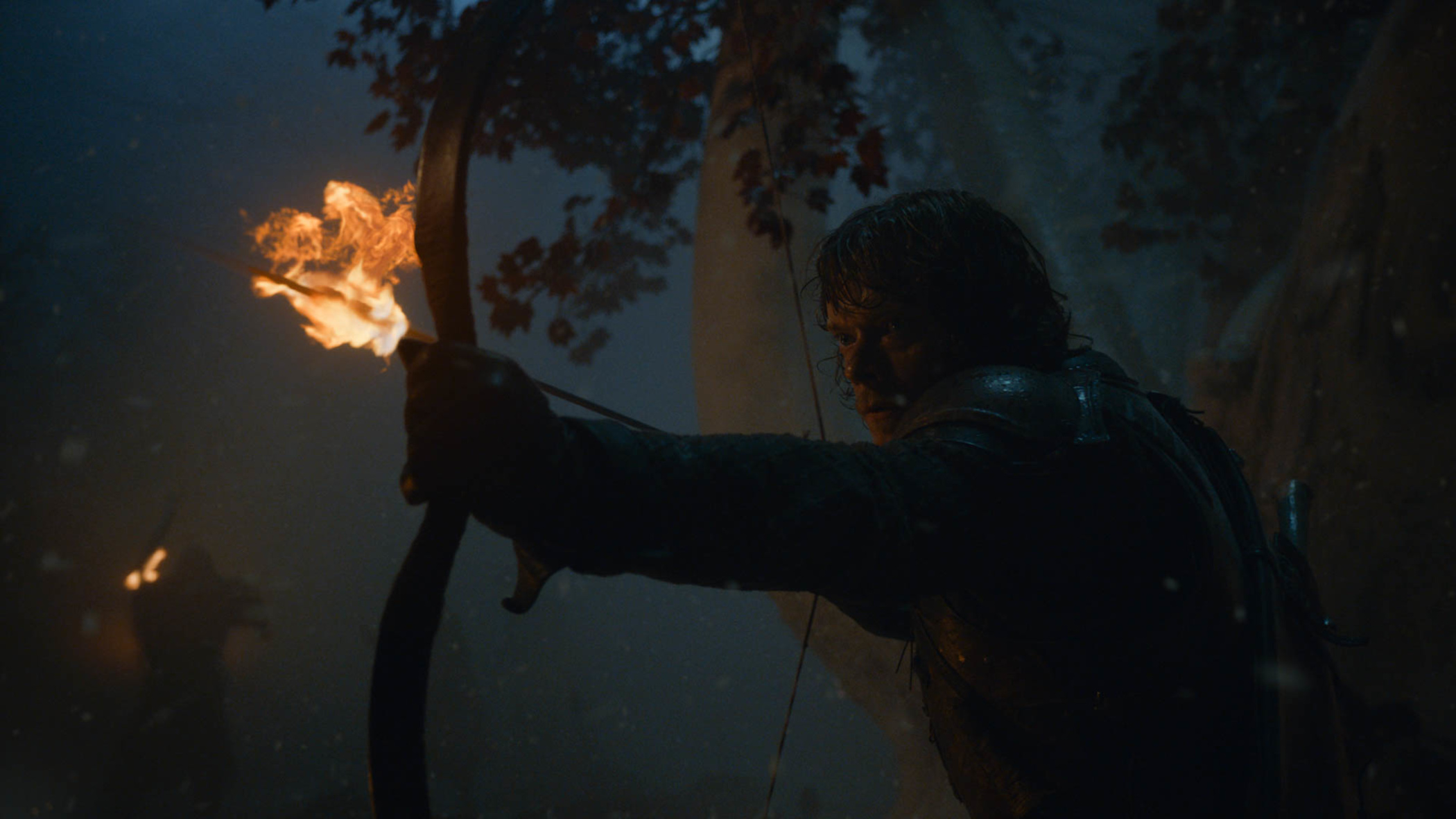 Theon shooting a flame-tipped arrow on Game of Thrones
