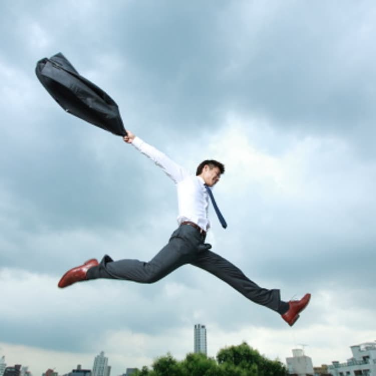 businessman-jumping-city