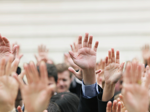 people-raising-hands