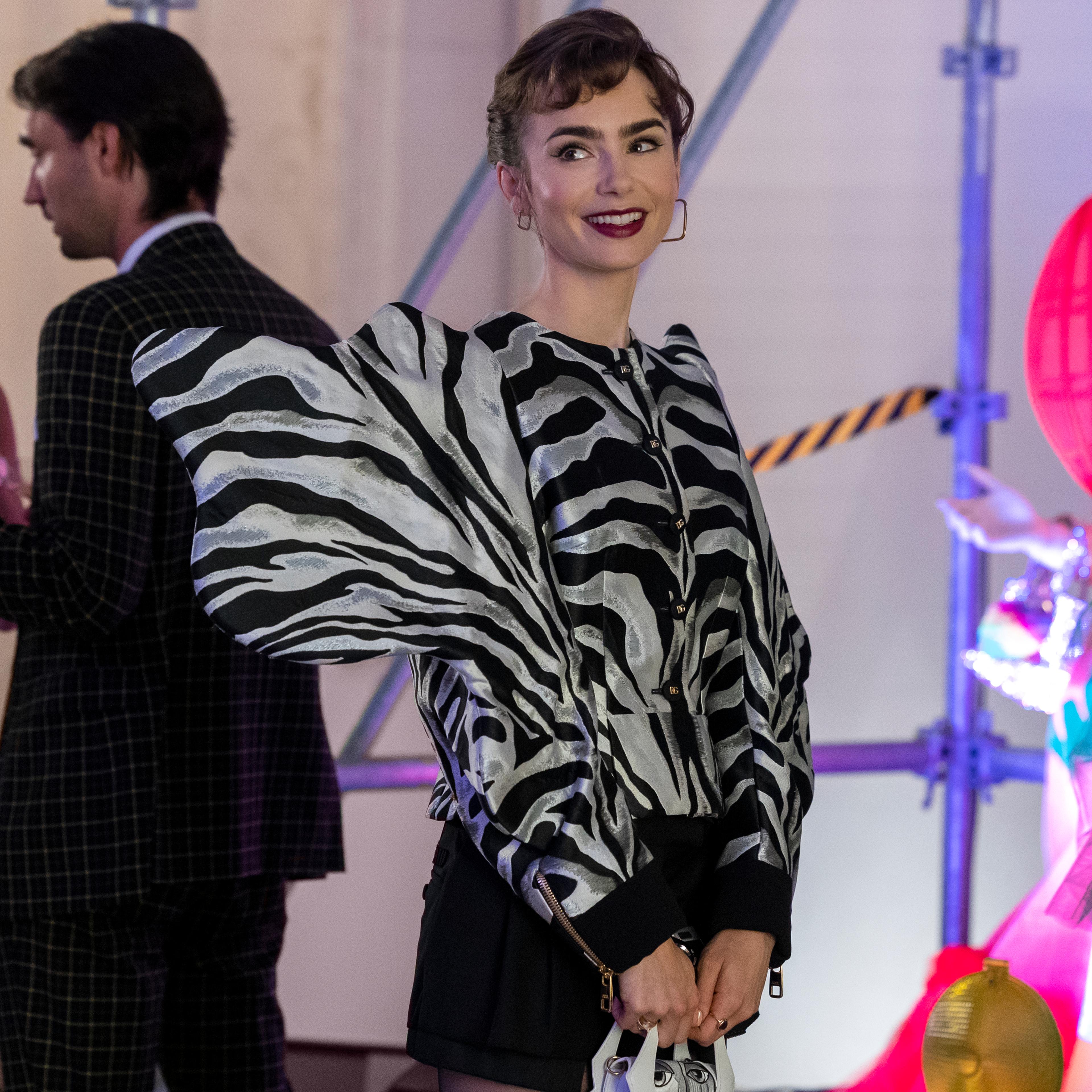 Emily in Paris. Lily Collins as Emily in episode 302 of Emily in Paris. Cr. Marie Etchegoyen/Netflix © 2022