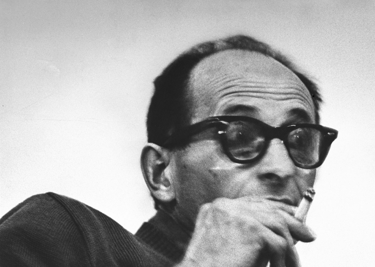 Adolf Eichmann awaits trial in Israel, 1961.