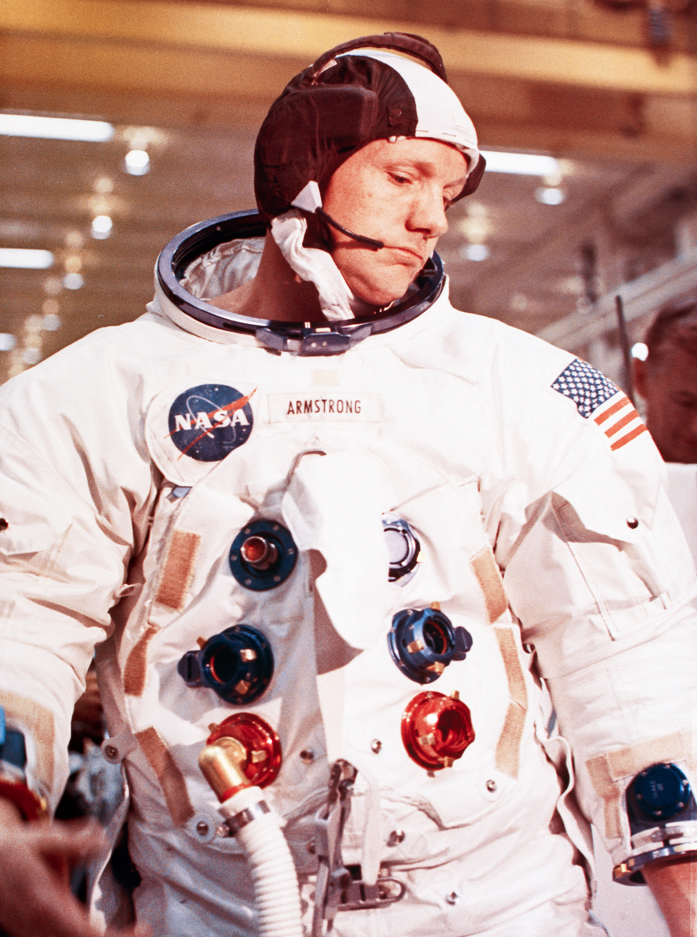 Apollo 11 mission commander Neil Armstrong puts on and checks out each element of his spacesuit before lift-off on July 20, 1969.