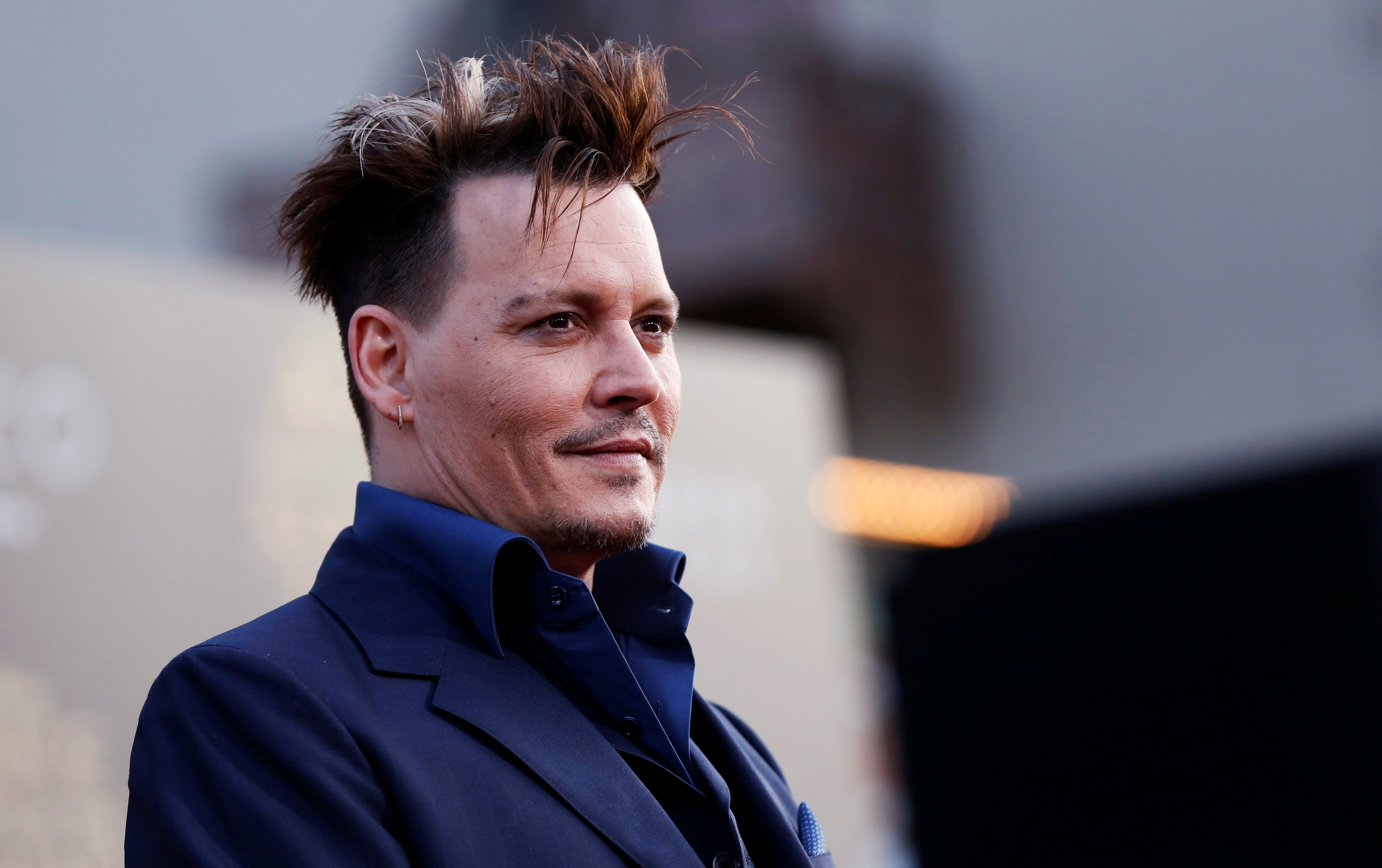 Cast member Depp poses at the premiere of "Alice Through the Looking Glass" at El Capitan theatre in Hollywood