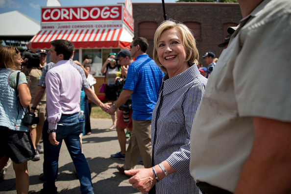 Hillary Clinton, former U.S. secretary of state and 2016 Democratic presidential candidate, walks through the Iowa State Fair in Des Moines, Iowa, U.S., on Saturday, Aug. 15, 2015.
