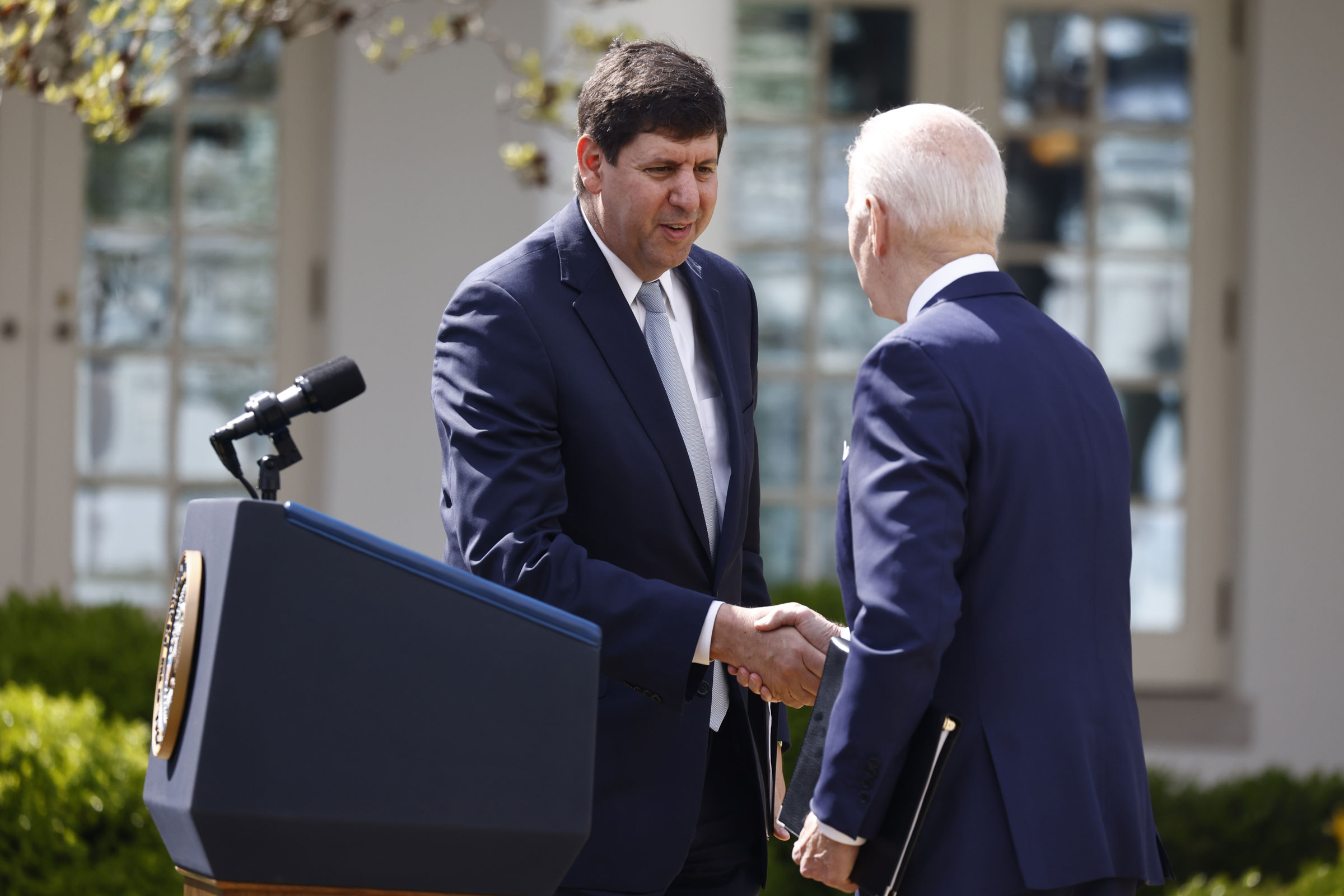 Steve Dettelbach, nominee for director of the Bureau of Alcohol, Tobacco, Firearms and Explosives, shakes hands with Joe Biden