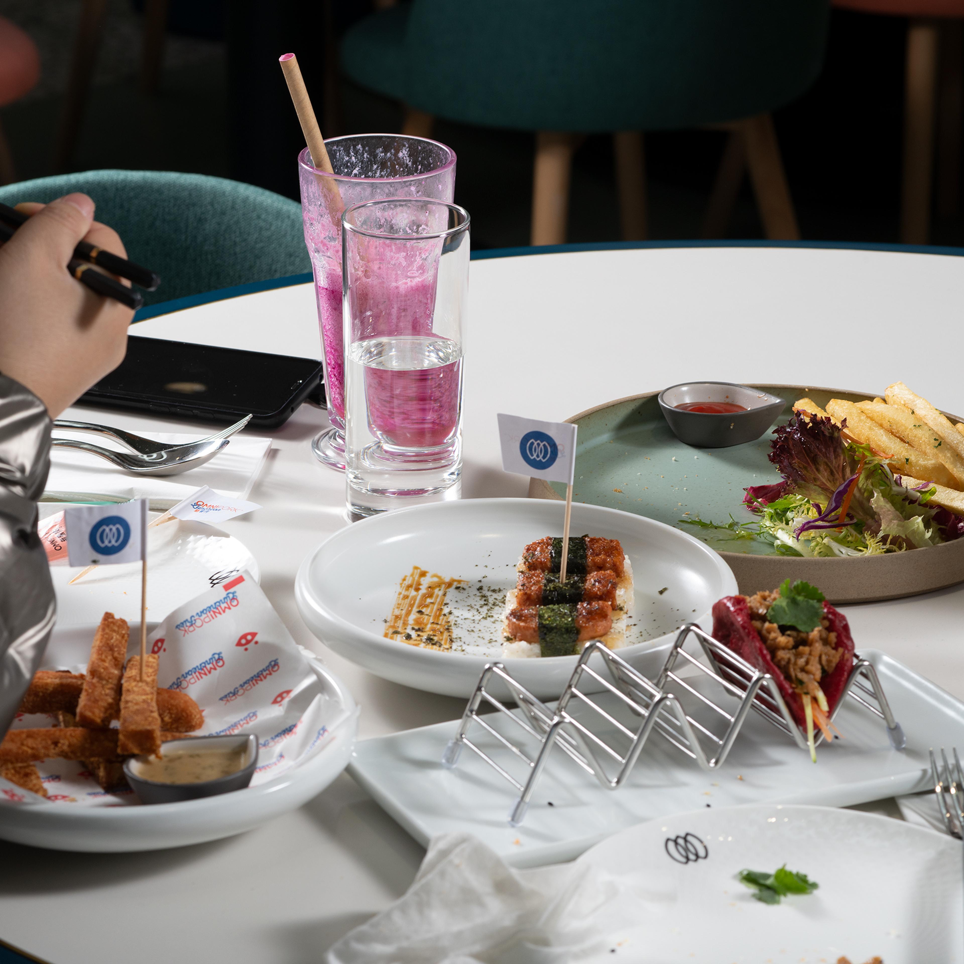 A customer tucks into a meat-free banquet at Green Common café in Shanghai on Jan. 13