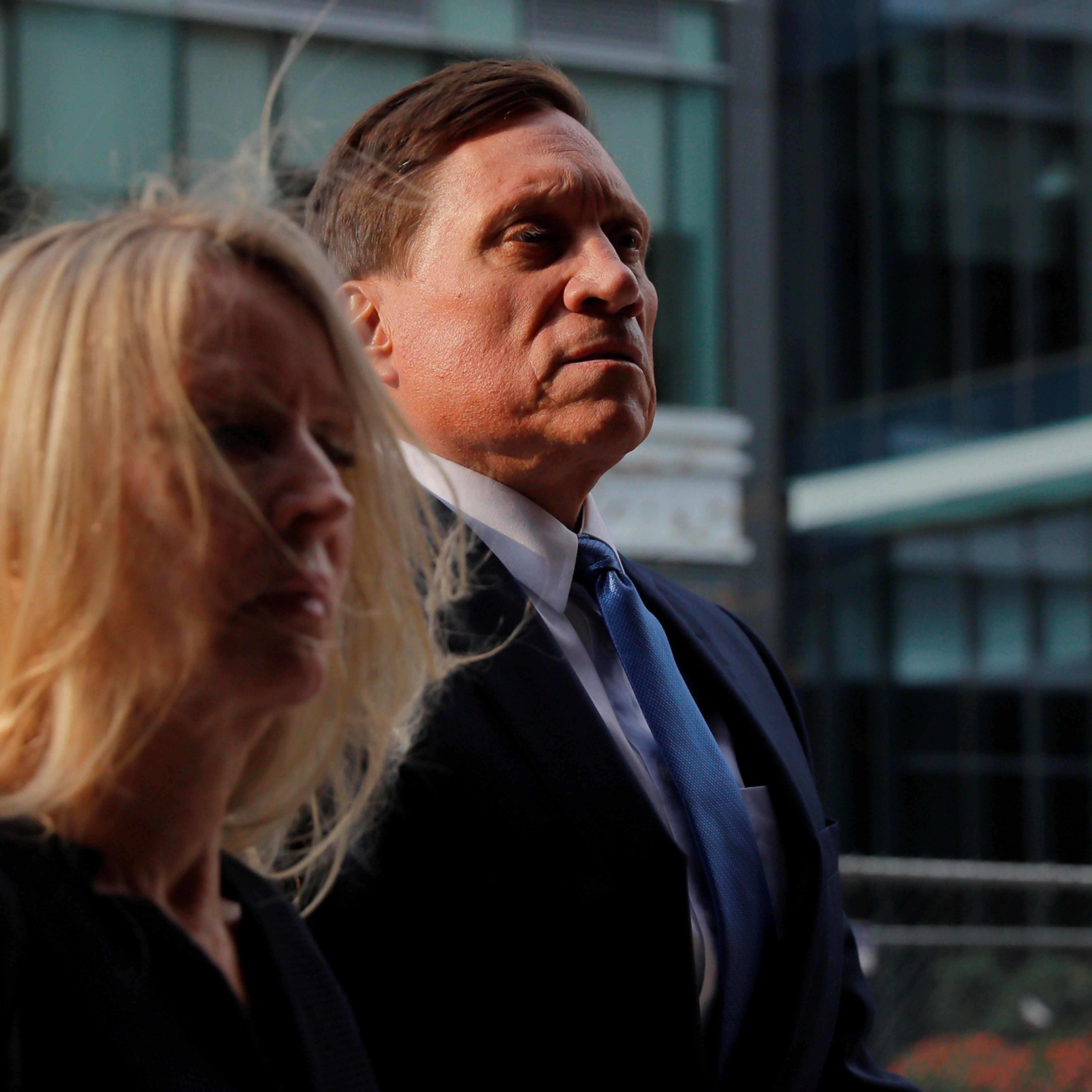 Private equity firm founder John Wilson, charged with participating in a scheme to pay bribes to fraudulently secure the admission of his children to top schools, arrives at federal court for the first day of jury selection in the first trial to result from the U.S. college admissions scandal, which has resulted in dozens of celebrities, executives and coaches facing criminal charges, in Boston, Massachusetts, U.S., September 8, 2021.