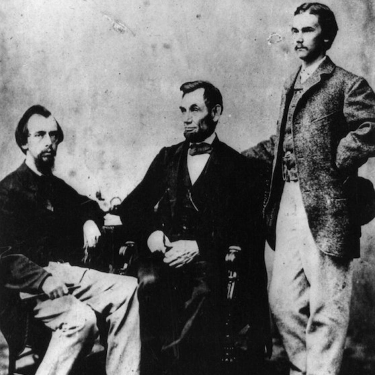 President Abraham Lincoln with Secretaries John Hay and John Nicolay.