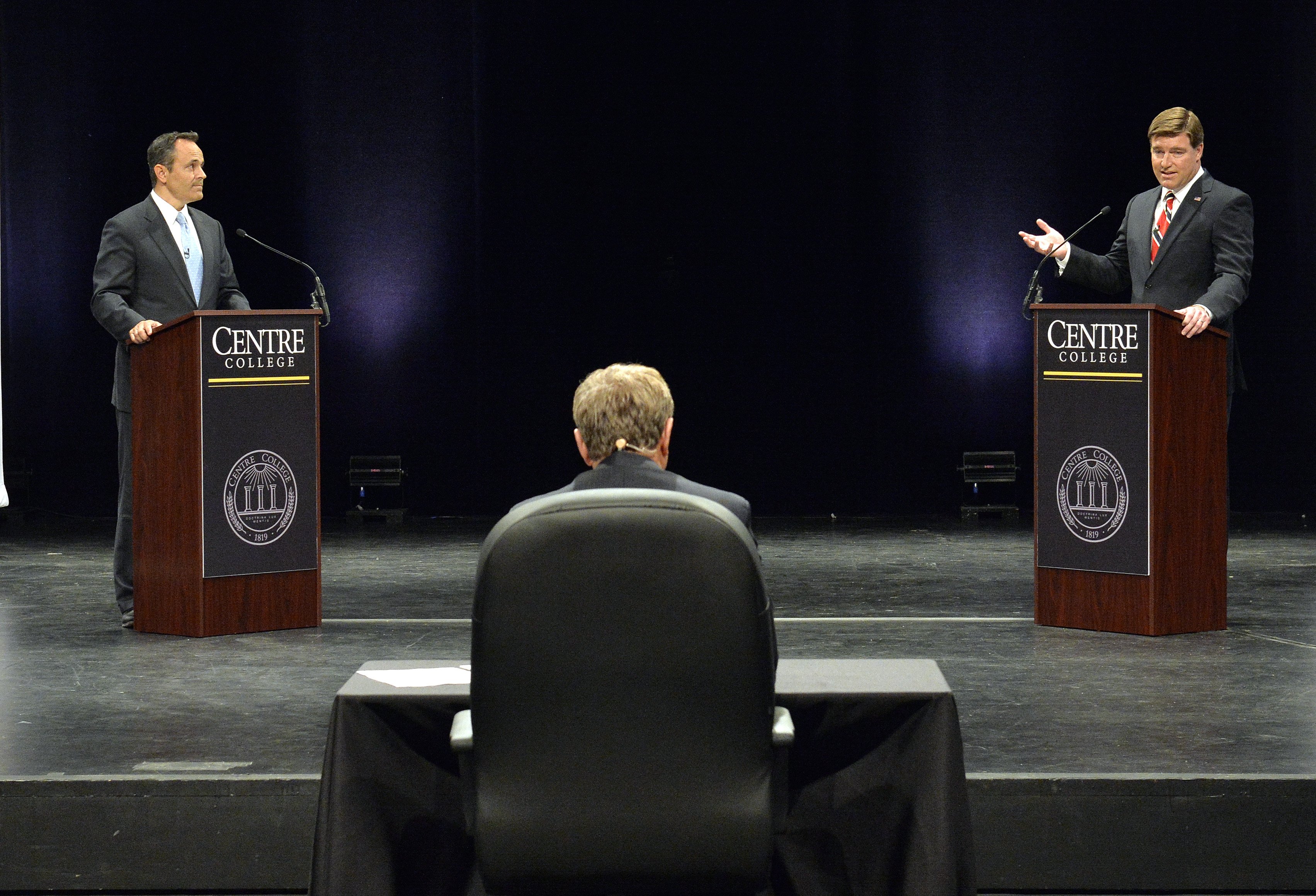Kentucky Democratic gubernatorial candidate Jack Conway, right, responds to a question from the moderator, as his opponent, Republican Matt Bevin Looks on during the 2015 Kentucky Gubernatorial Debate hosted by Centre College on Oct. 6, 2015, in Danville