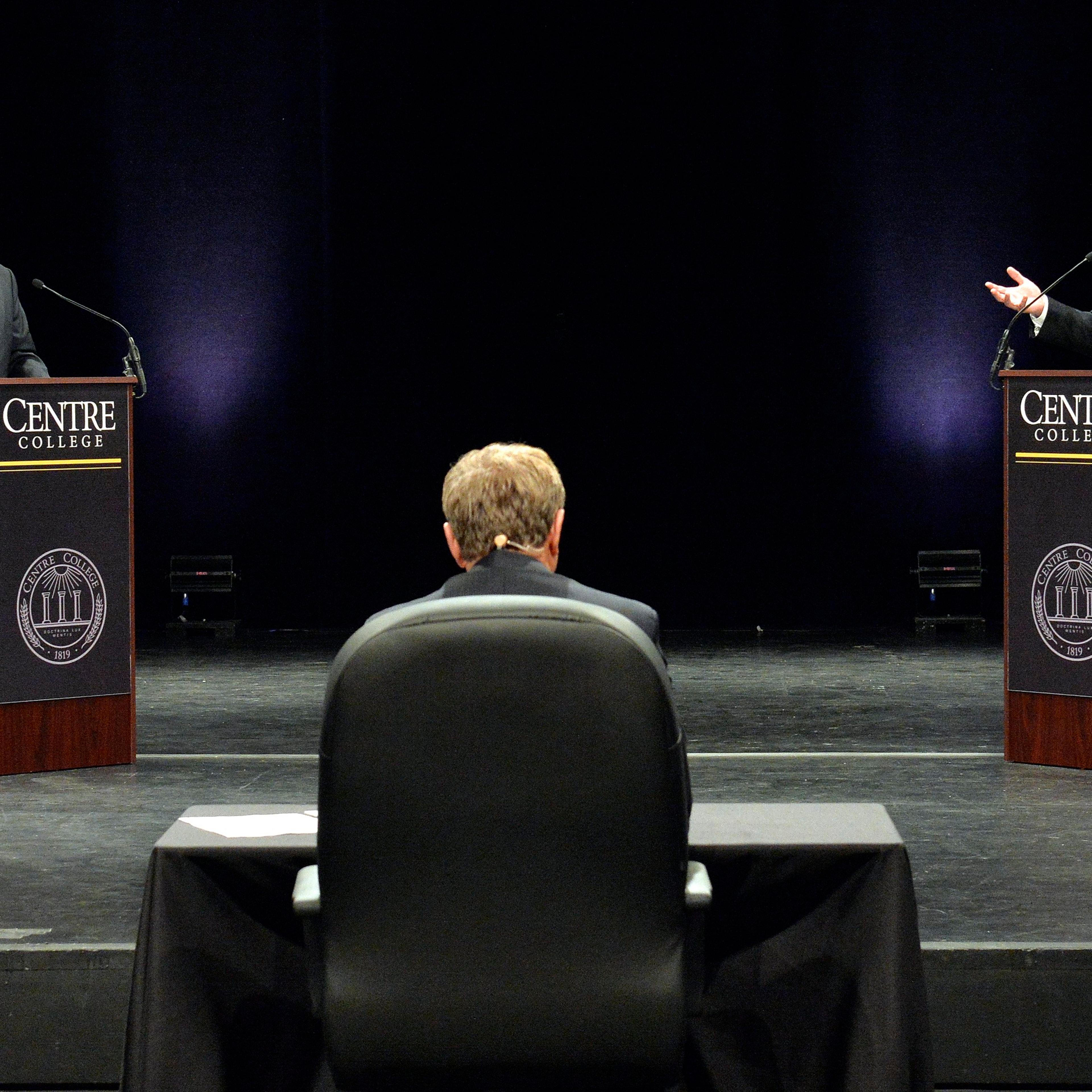 Kentucky Democratic gubernatorial candidate Jack Conway, right, responds to a question from the moderator, as his opponent, Republican Matt Bevin Looks on during the 2015 Kentucky Gubernatorial Debate hosted by Centre College on Oct. 6, 2015, in Danville