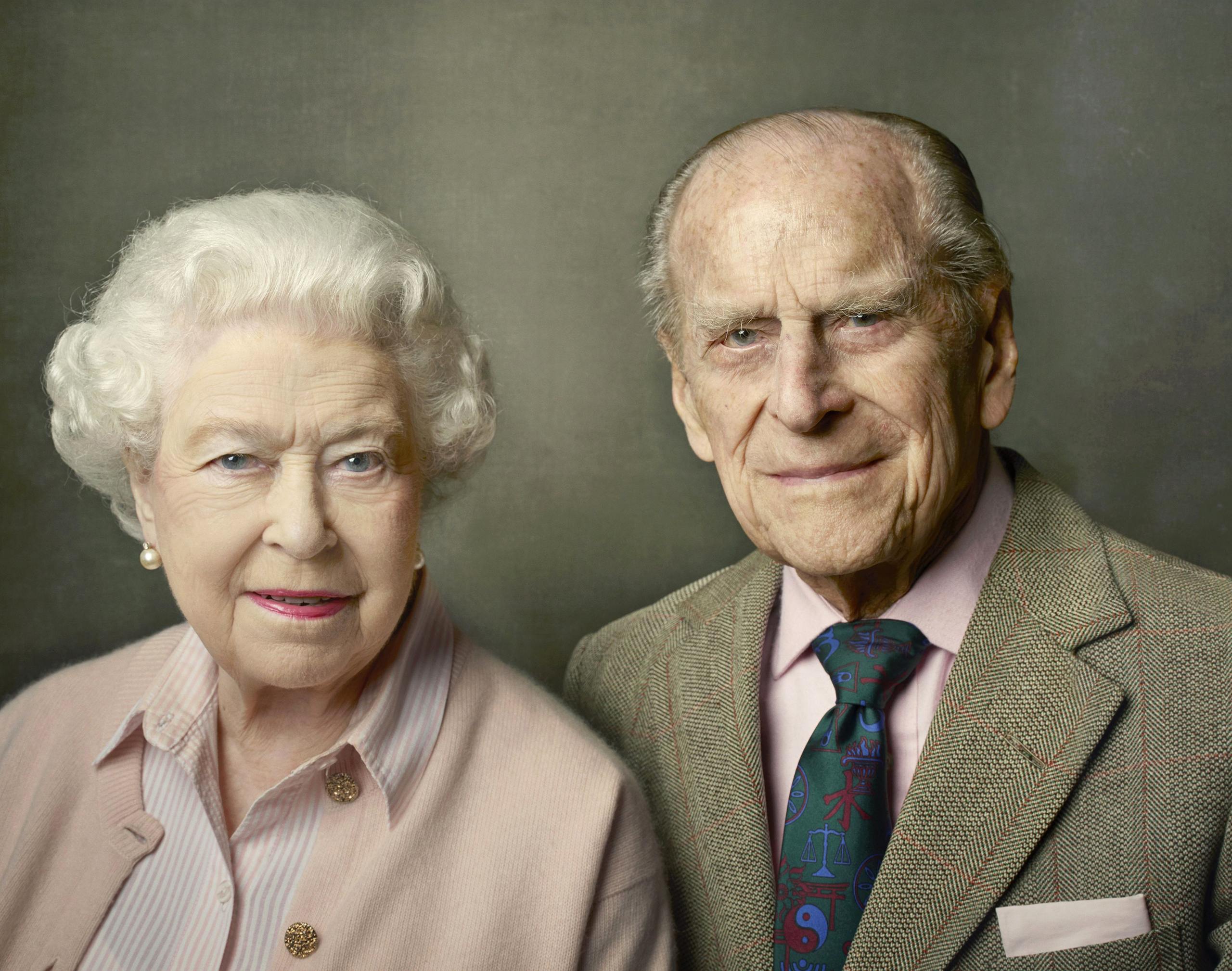 In this undated photo released by Buckingham Palace on June 10, 2016, Britain's Queen Elizabeth II and Prince Philip, the Duke of Edinburgh, pose for a photograph to mark the Queen's 90th birthday in Windsor. The queen, Britain’s oldest and longest-reign