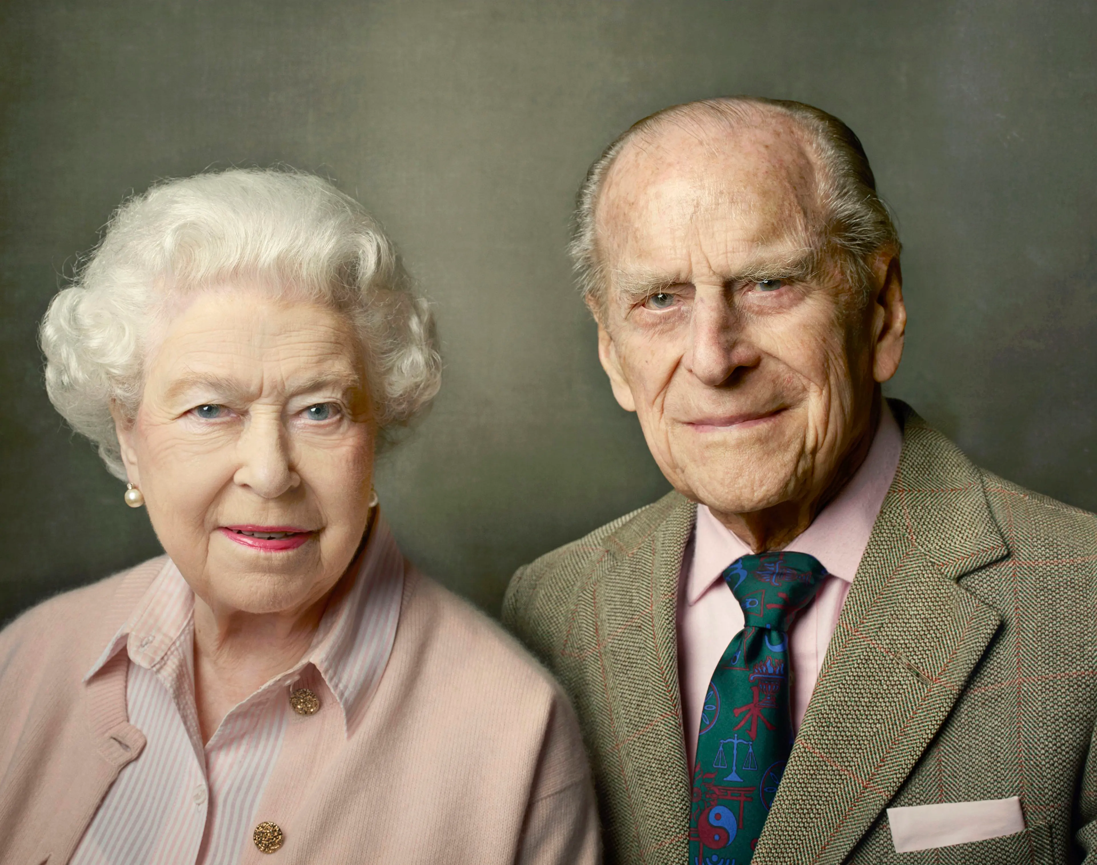 In this undated photo released by Buckingham Palace on June 10, 2016, Britain's Queen Elizabeth II and Prince Philip, the Duke of Edinburgh, pose for a photograph to mark the Queen's 90th birthday in Windsor. The queen, Britain’s oldest and longest-reign