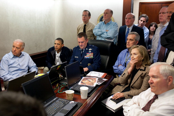 President Barack Obama, Vice President Joe Biden, Secretary of State Hillary Clinton and members of the national security team receive an update on the mission against Osama bin Laden in the Situation Room of the White House May 1, 2011 in Washington, DC