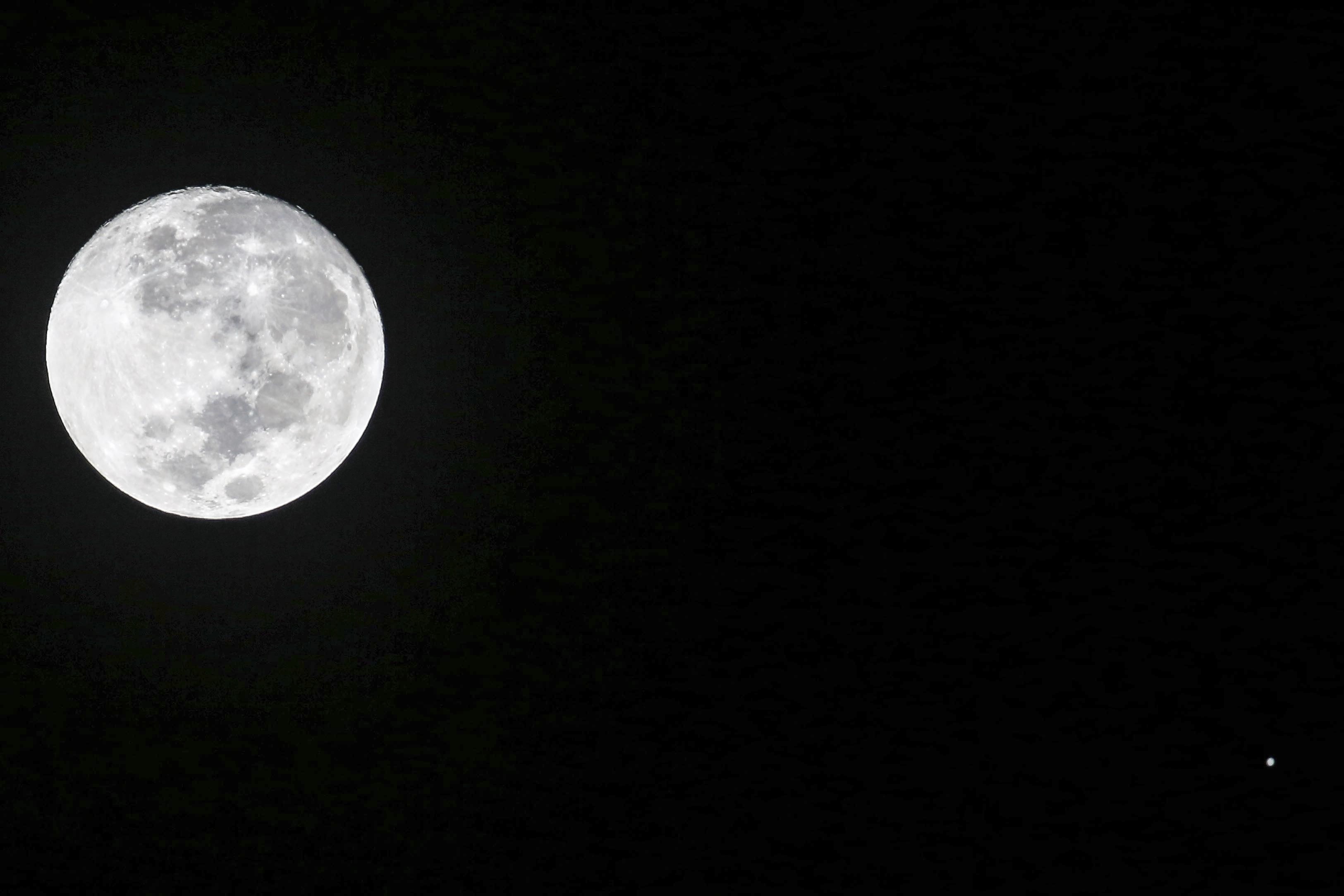 Planet Jupiter Appears Beside Moon