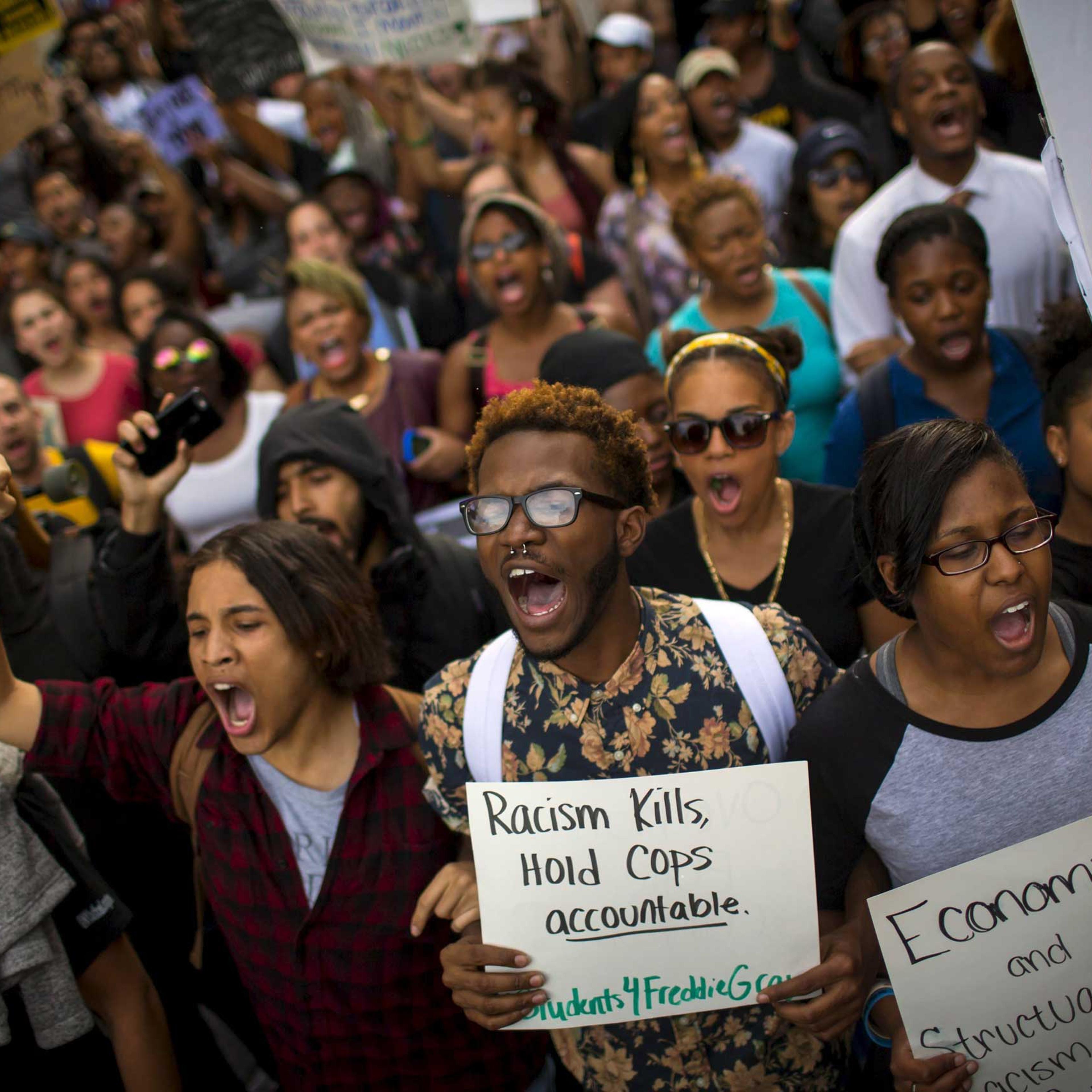 Demonstrators march in Baltimore on April 29, 2015.