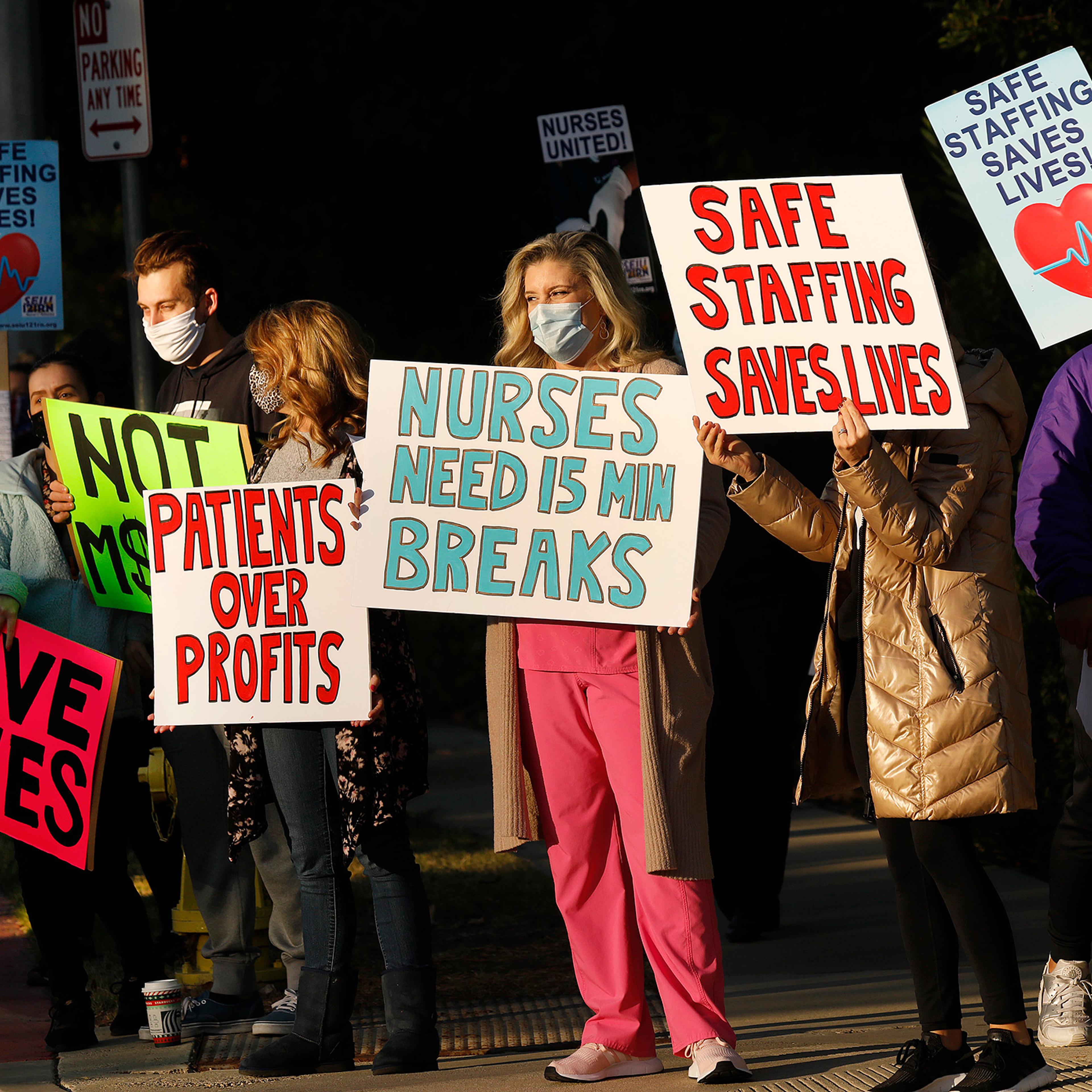 Nurses and licensed medical professionals picket in front of Los Robles Regional Medical Center to raise concerns over lack of COVID-19 testing for patients and staff, continued insufficient PPE and dangerous lack of staff on duty, in Thousand Oaks, Cali
