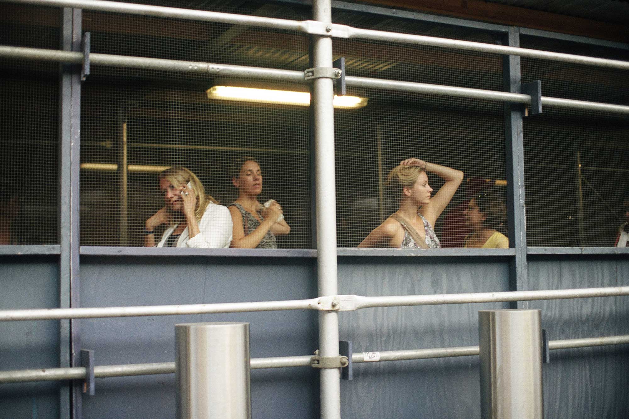 People wait for the bus close to Penn Station in New York City. Two combat vets and two journalists (and a dog) walked along the Amtrak rail lines from Washington, D.C. to Philadelphia to Pittsburgh over the course of a year. Through the heat and summer 