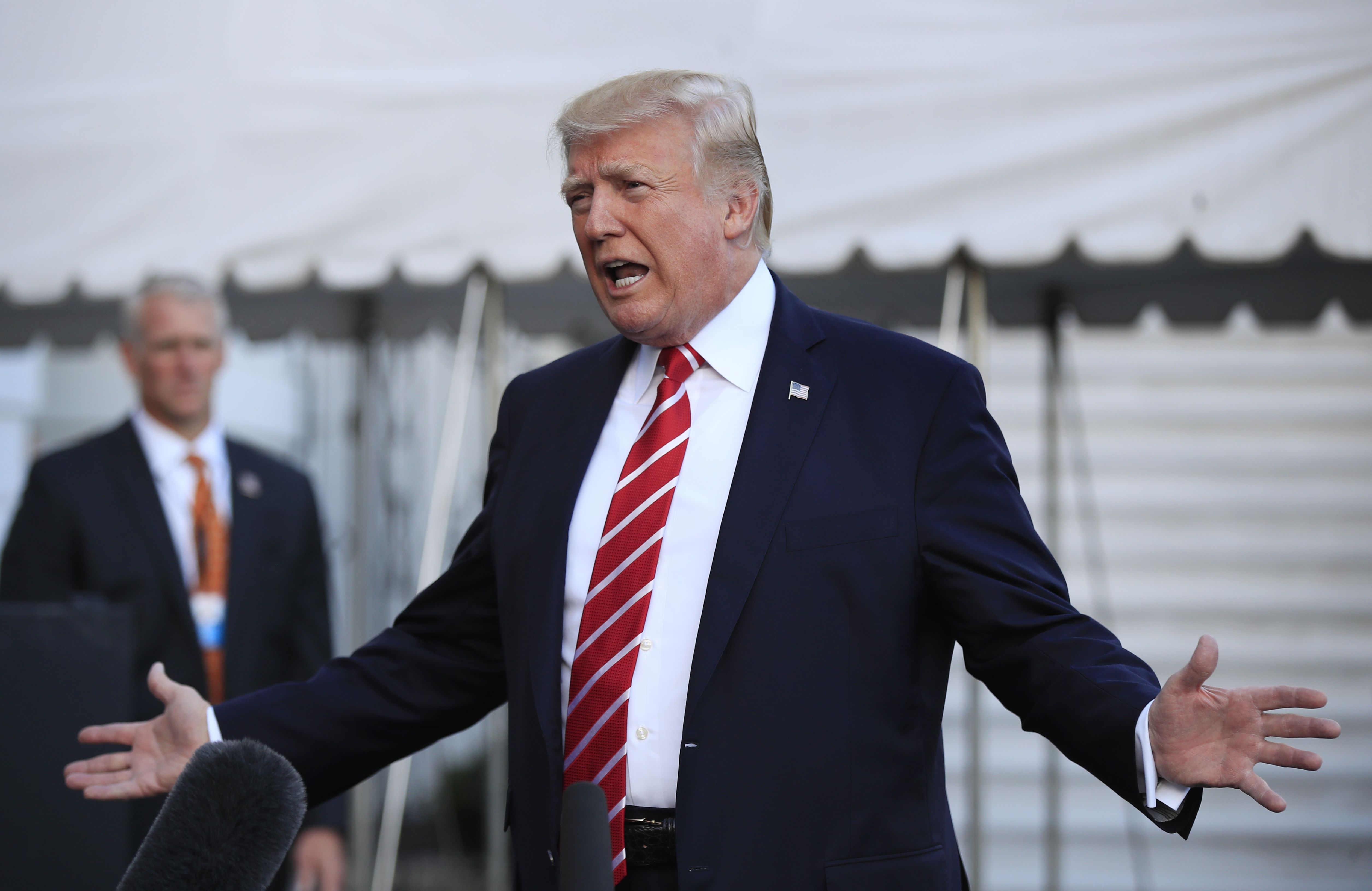 Trump speaks to reporters at Andres Air Force Base