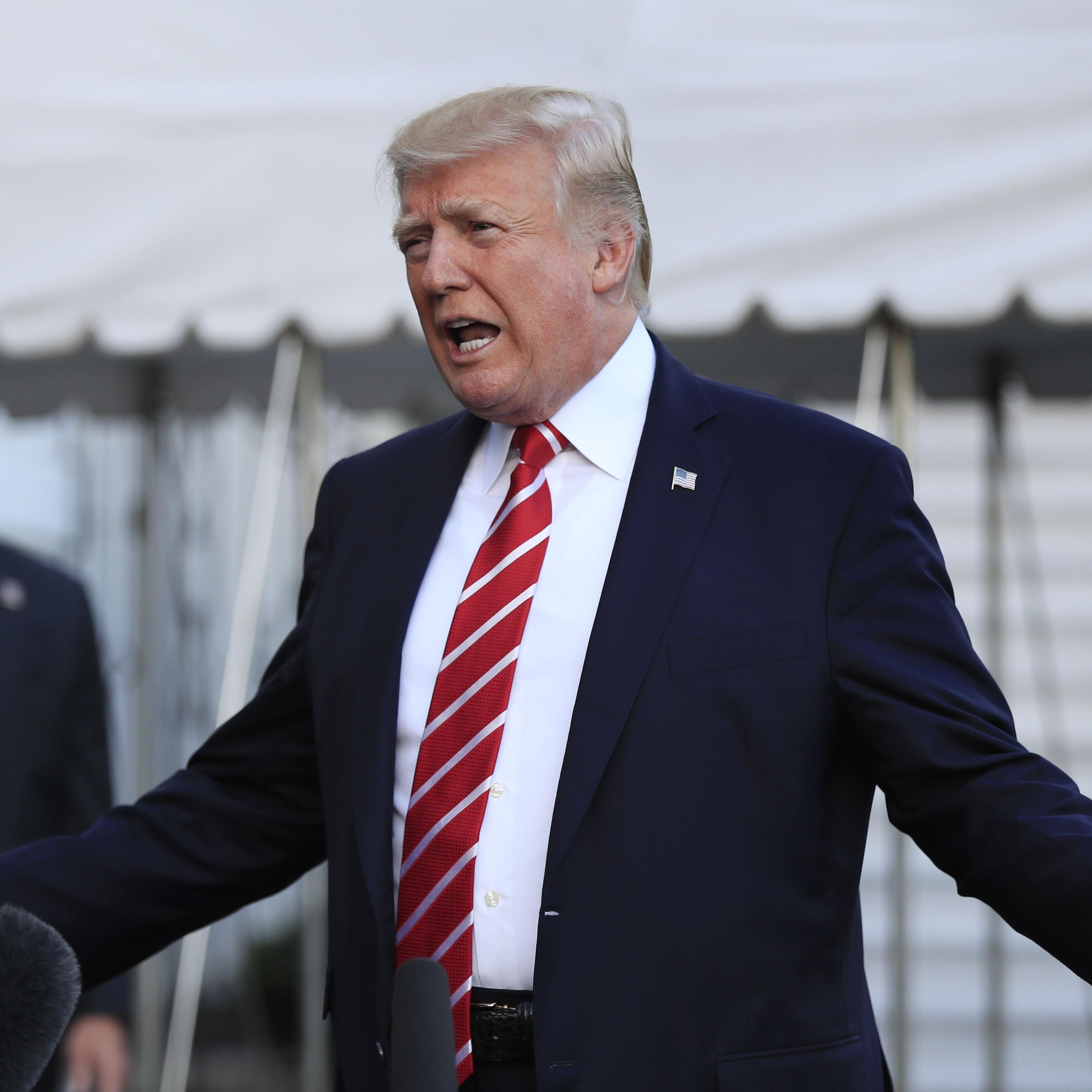 Trump speaks to reporters at Andres Air Force Base