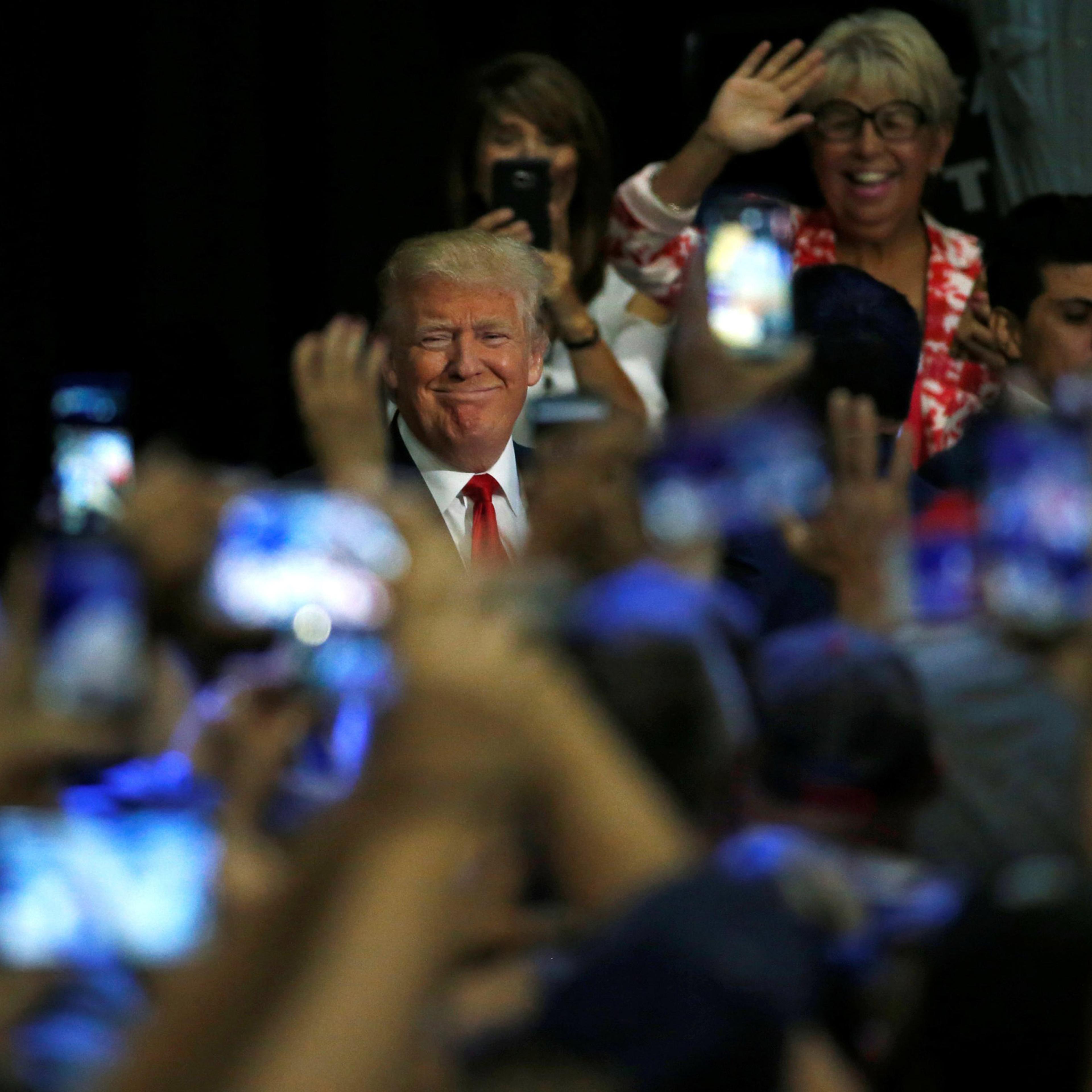 Trump arrives for a rally with supporters in Fresno, California