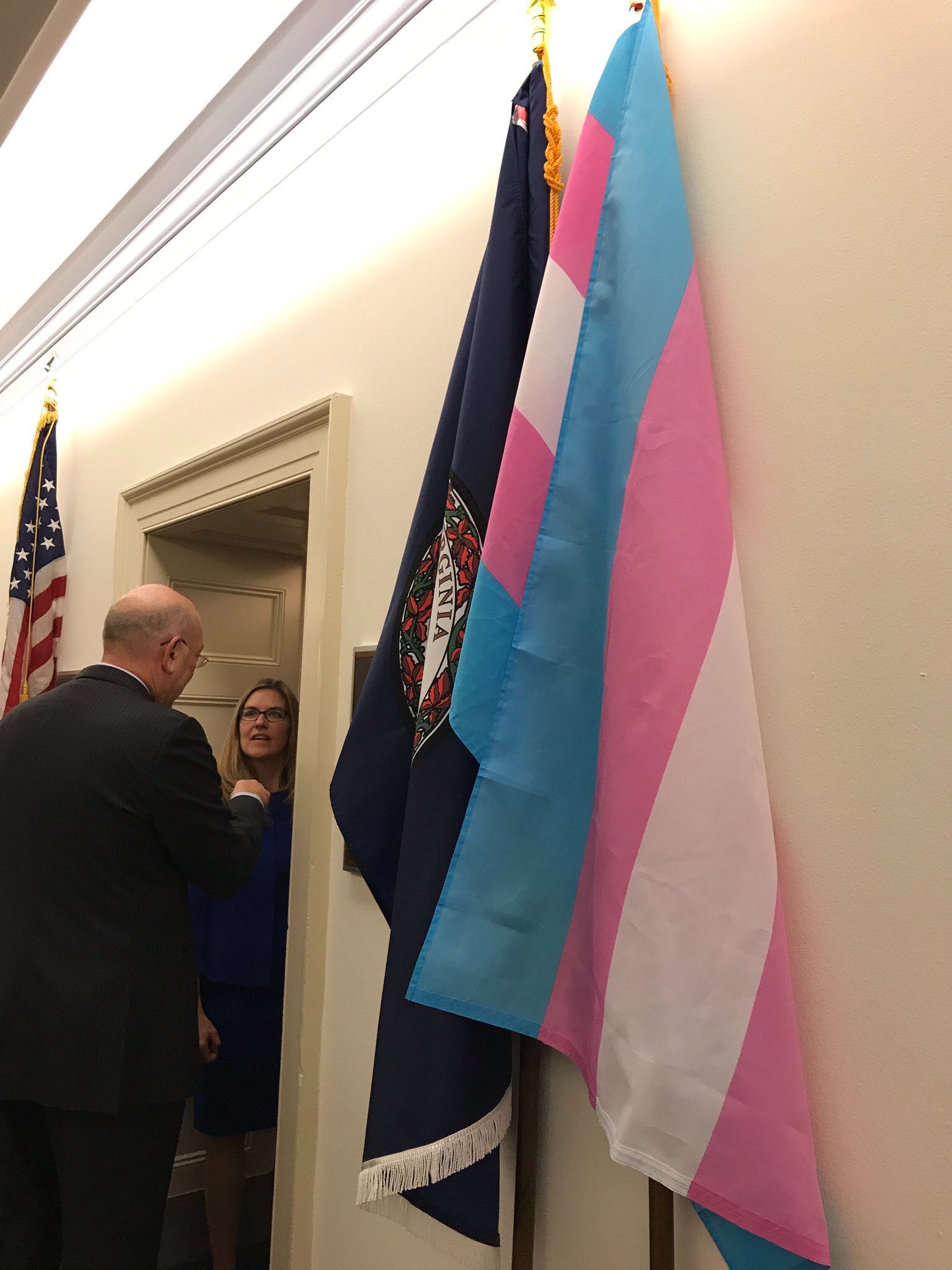 The trans pride flag hangs outside congresswoman Wexton's office. 