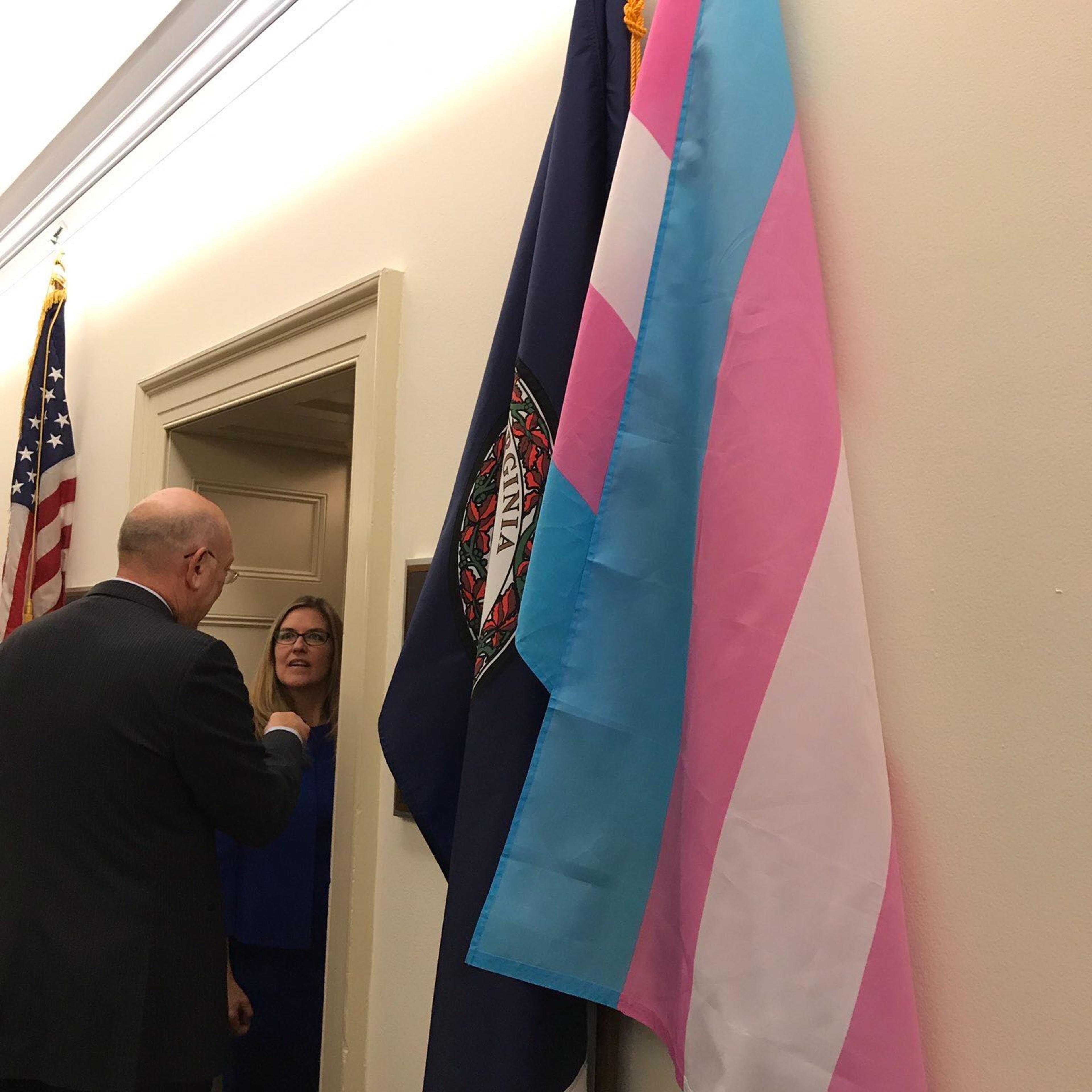 The trans pride flag hangs outside congresswoman Wexton's office.
