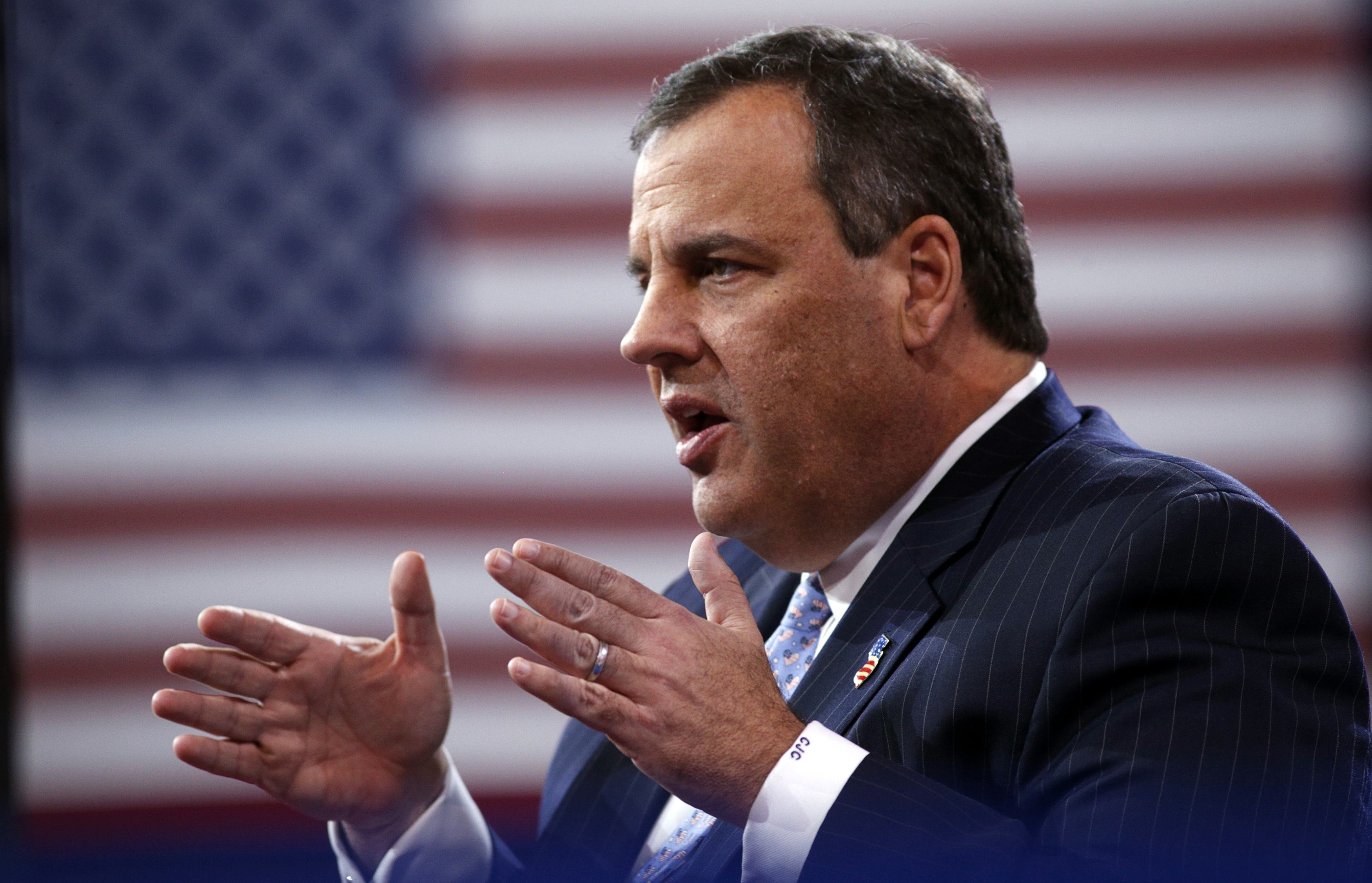 New Jersey Governor Christie speaks while being interviewed onstage at the Conservative Political Action Conference (CPAC) at National Harbor in Maryland