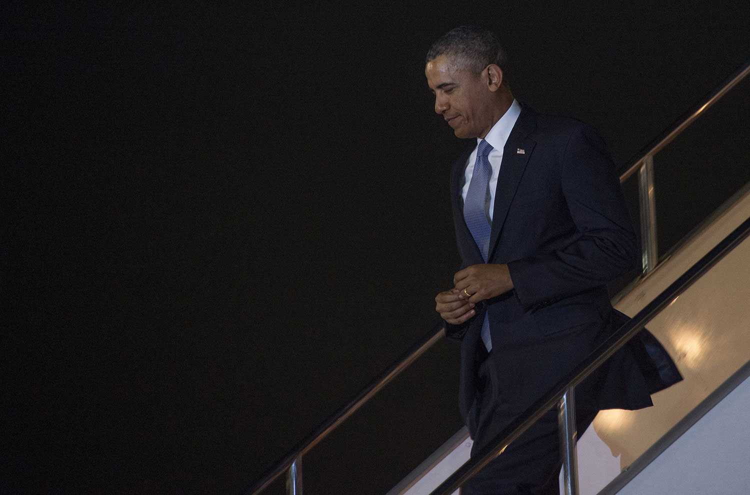 President Obama walks off Air Force One as he arrives at Haneda Airport in Tokyo, on April 23, 2014.