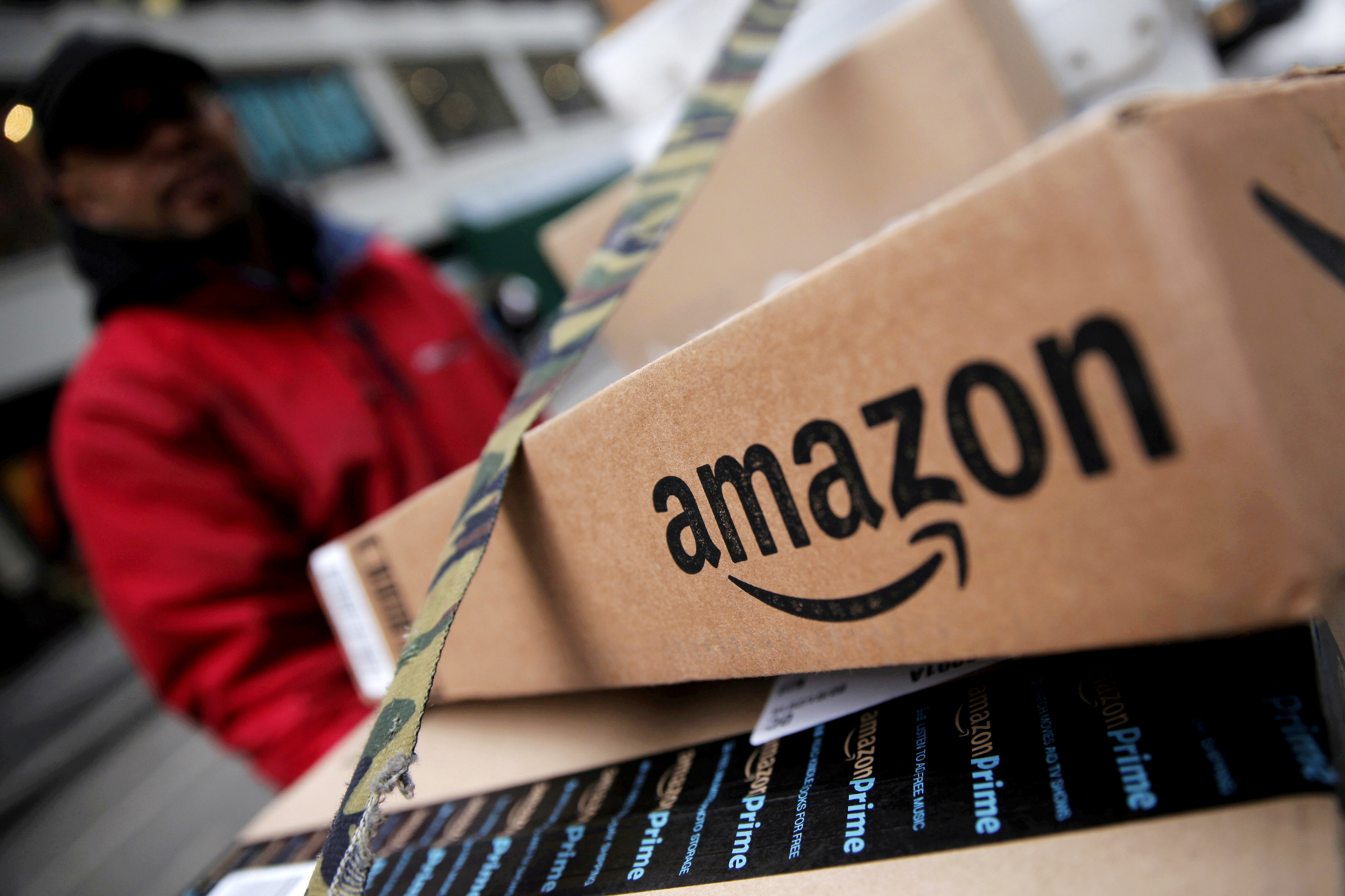 FILE PHOTO: Amazon boxes are seen stacked for delivery in Manhattan